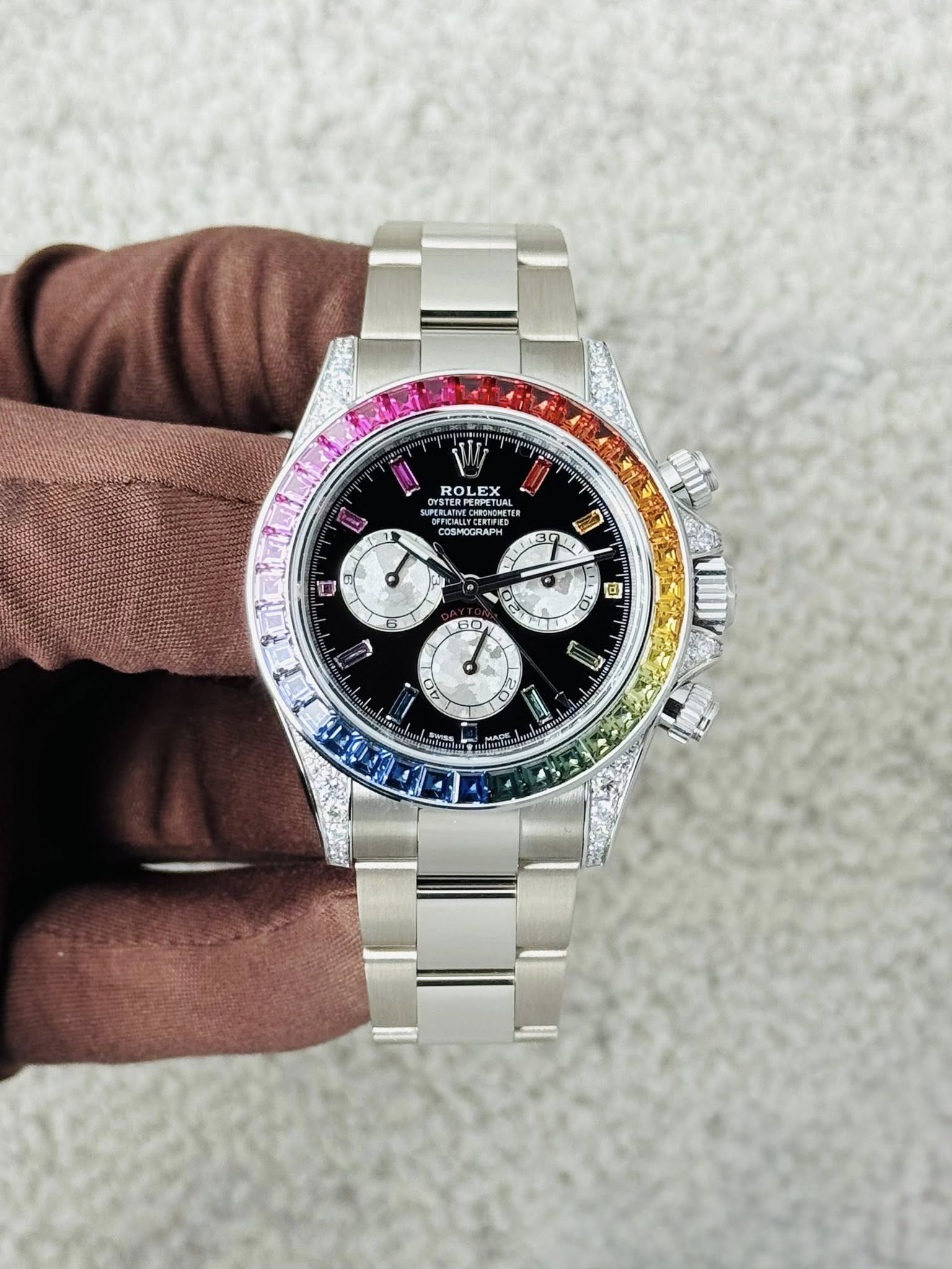 May be an image of wrist watch and text