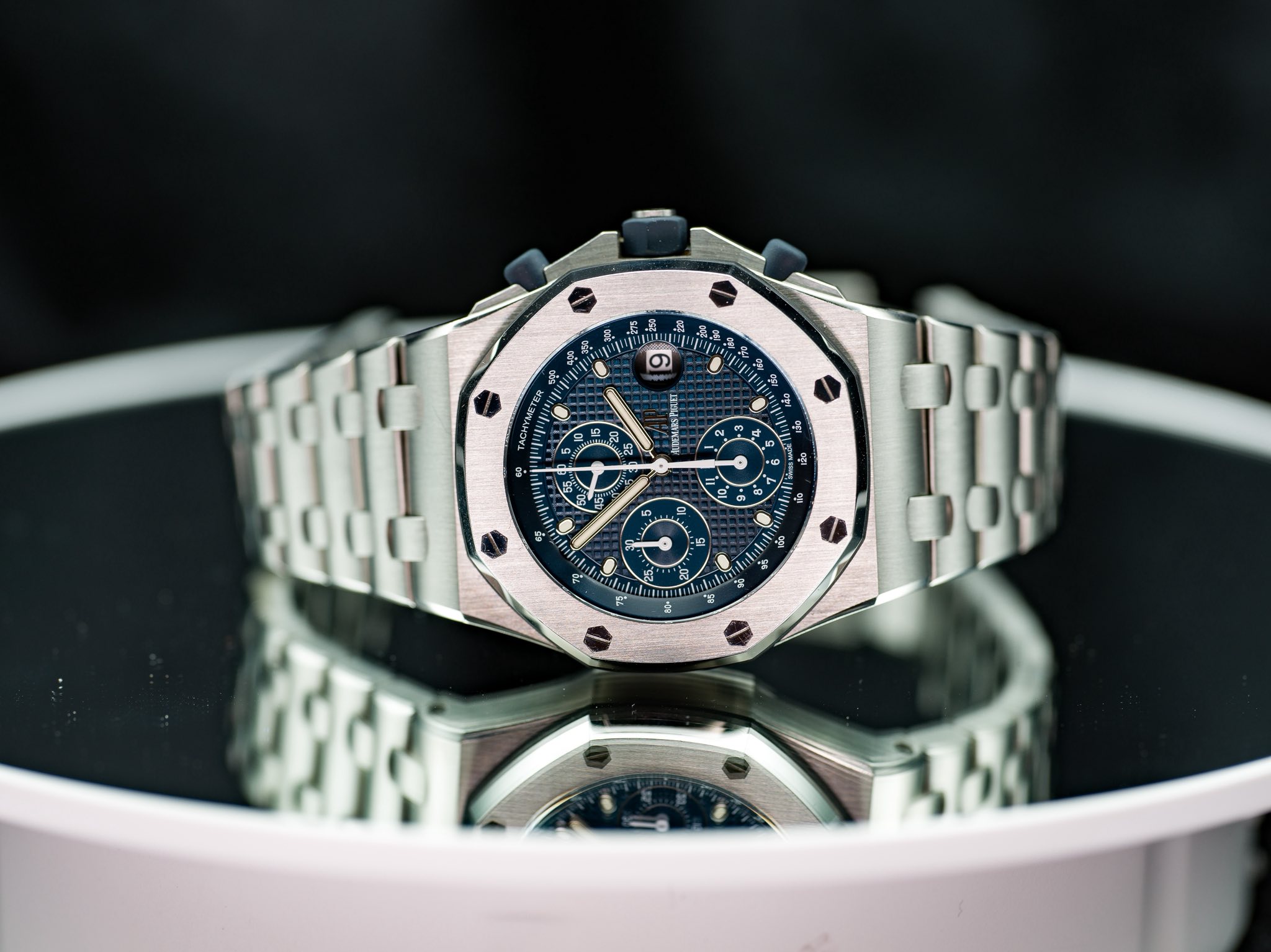 May be an image of wrist watch and text