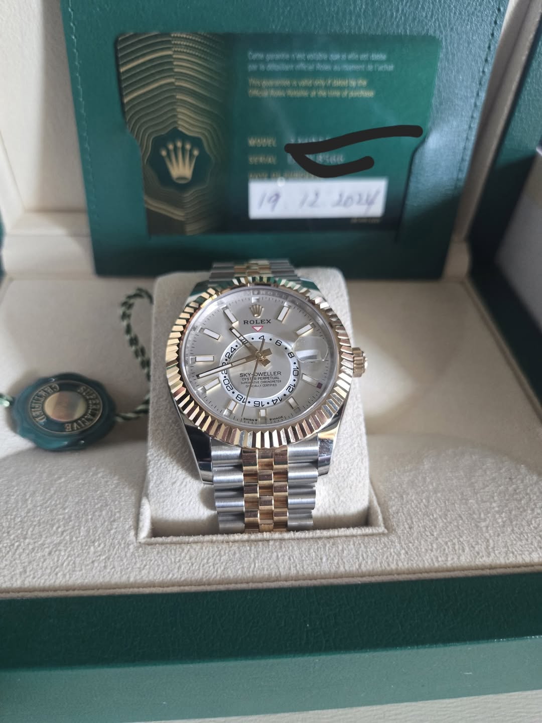 May be an image of wrist watch and text