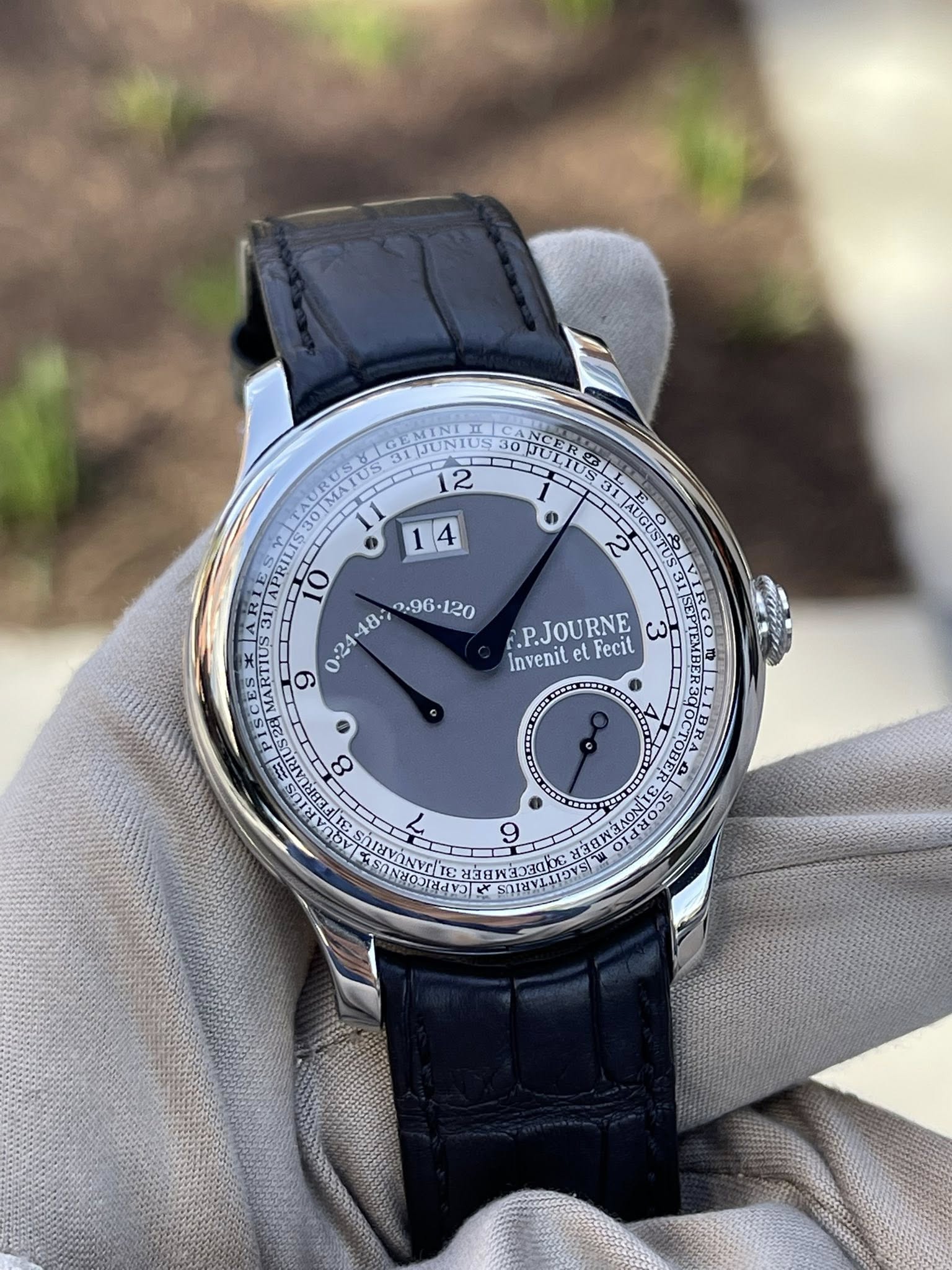 May be an image of wrist watch and text