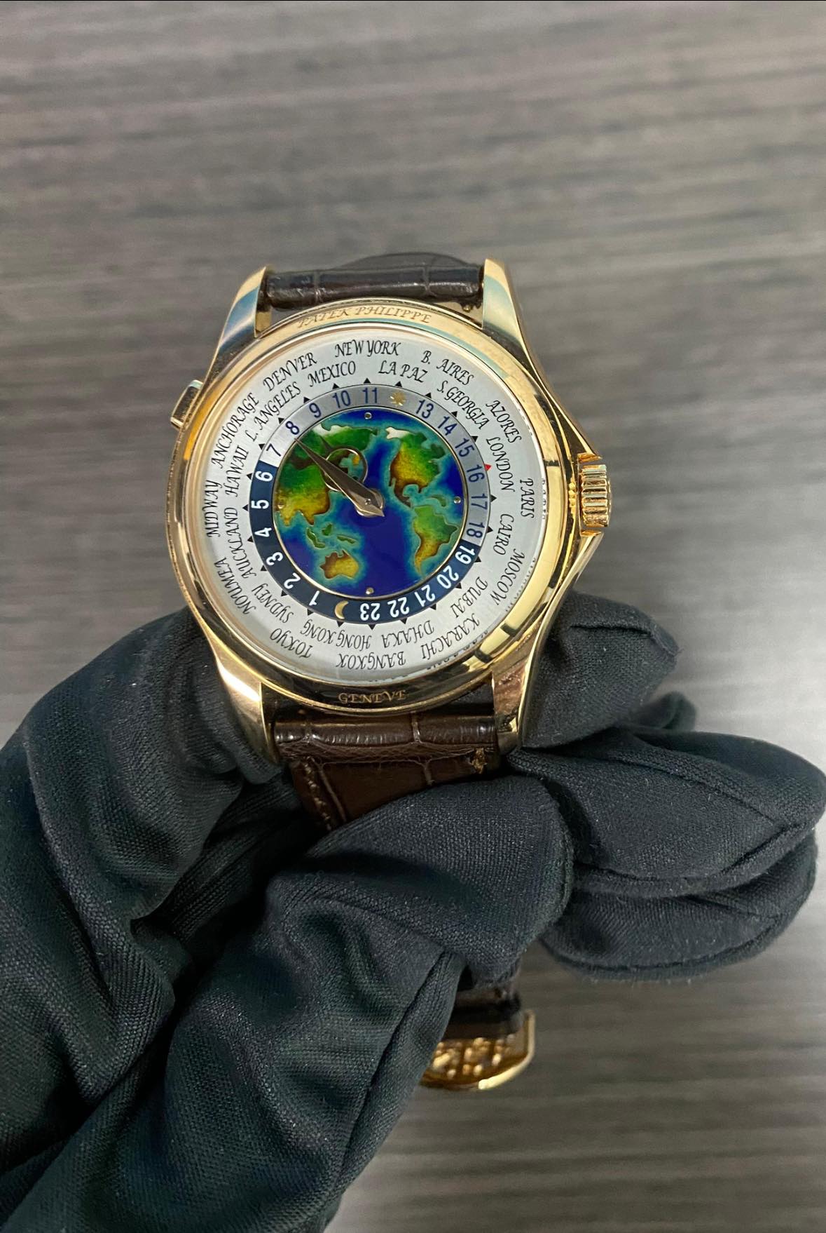May be an image of wrist watch and text