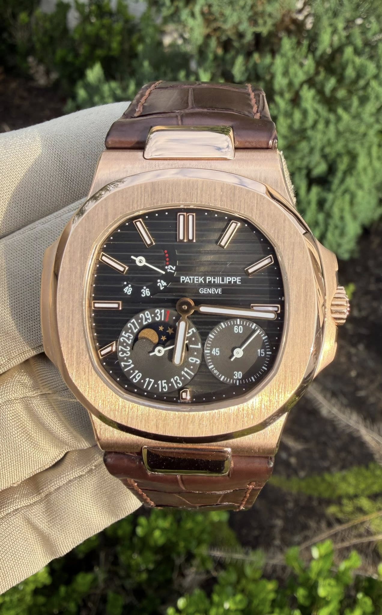 May be an image of wrist watch and text