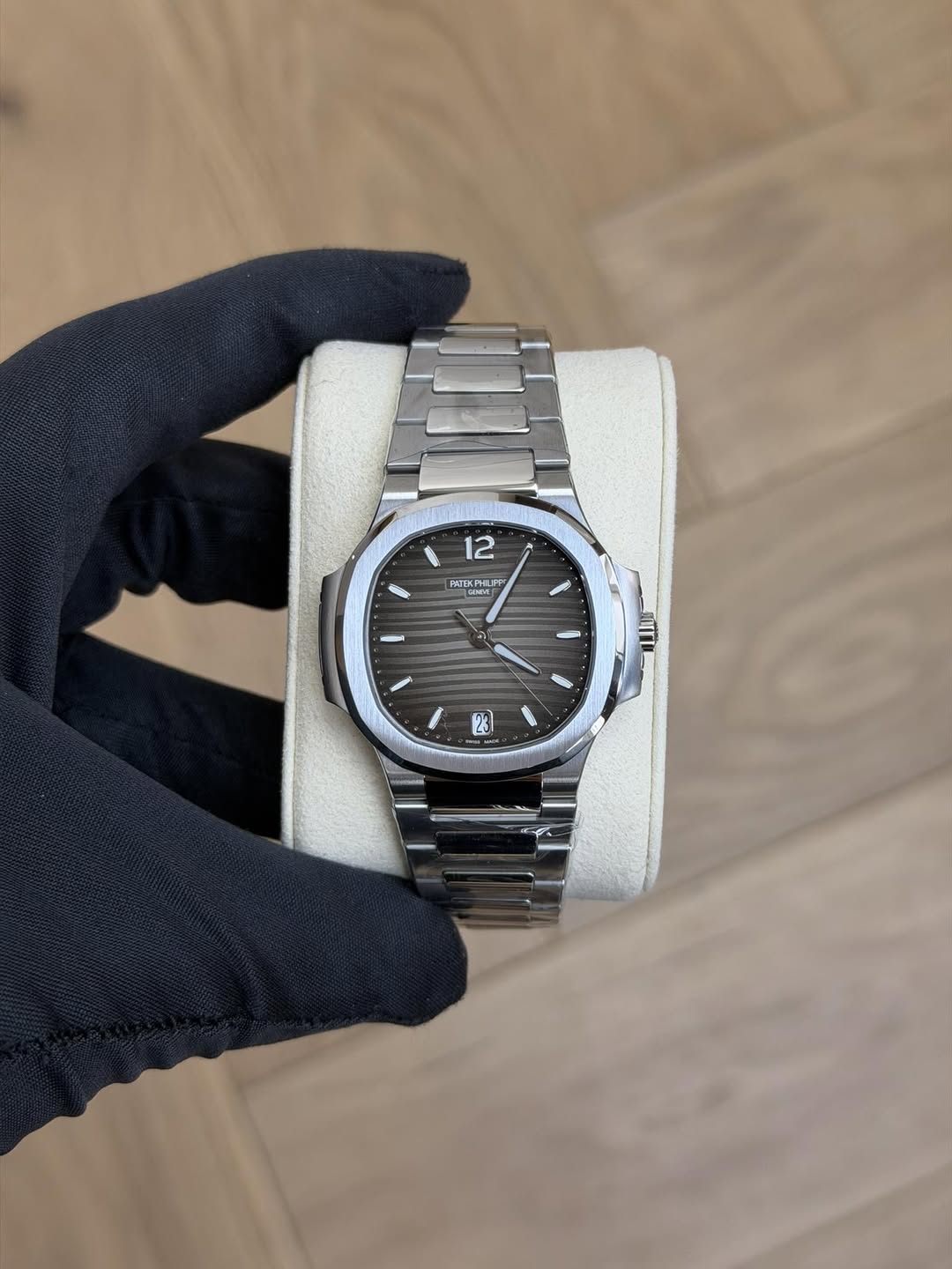 May be an image of wrist watch and text
