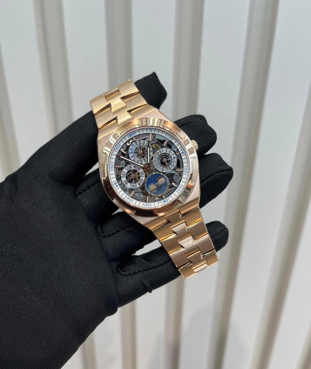 May be an image of wrist watch and text