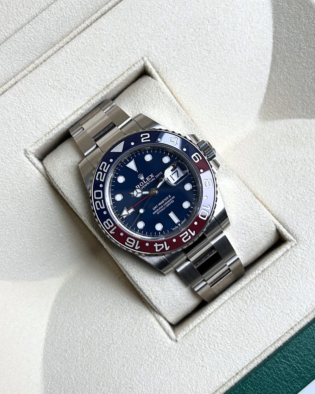 May be an image of wrist watch and text