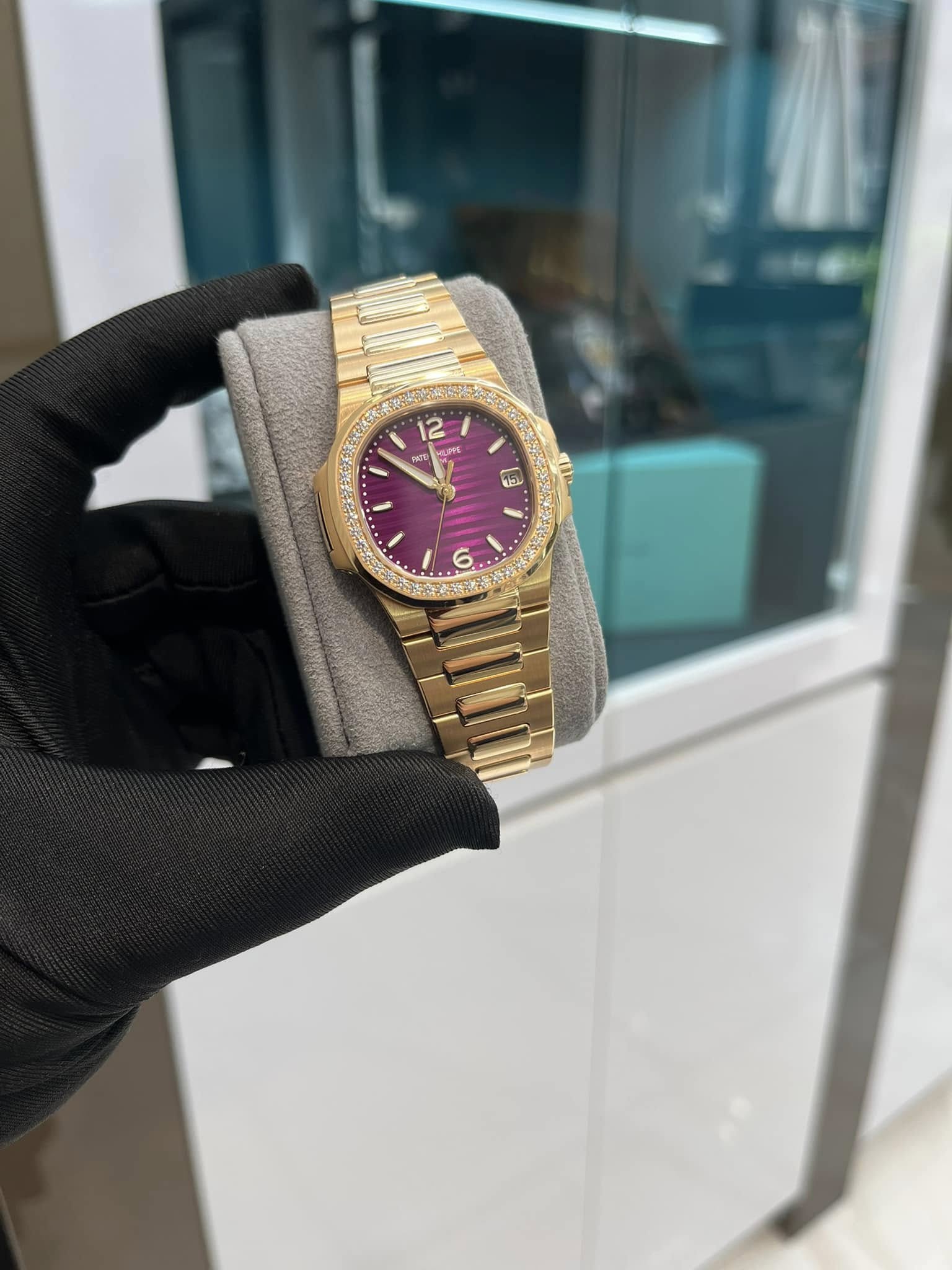 May be an image of wrist watch and text