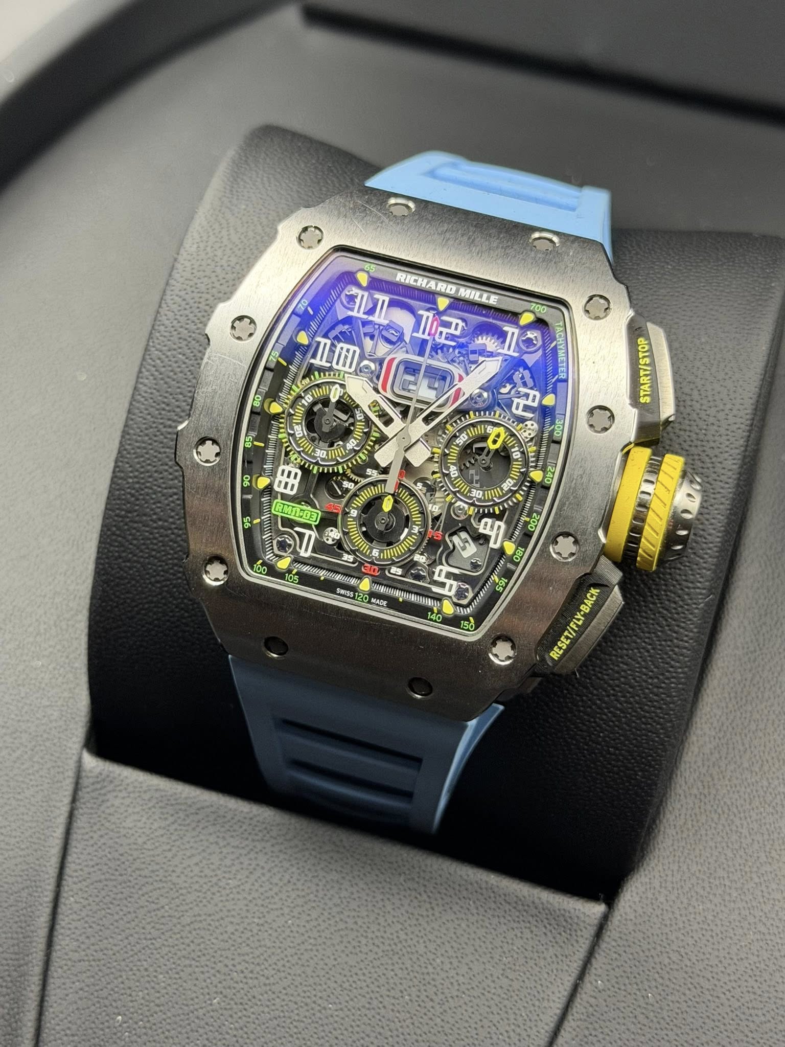 May be an image of wrist watch and text