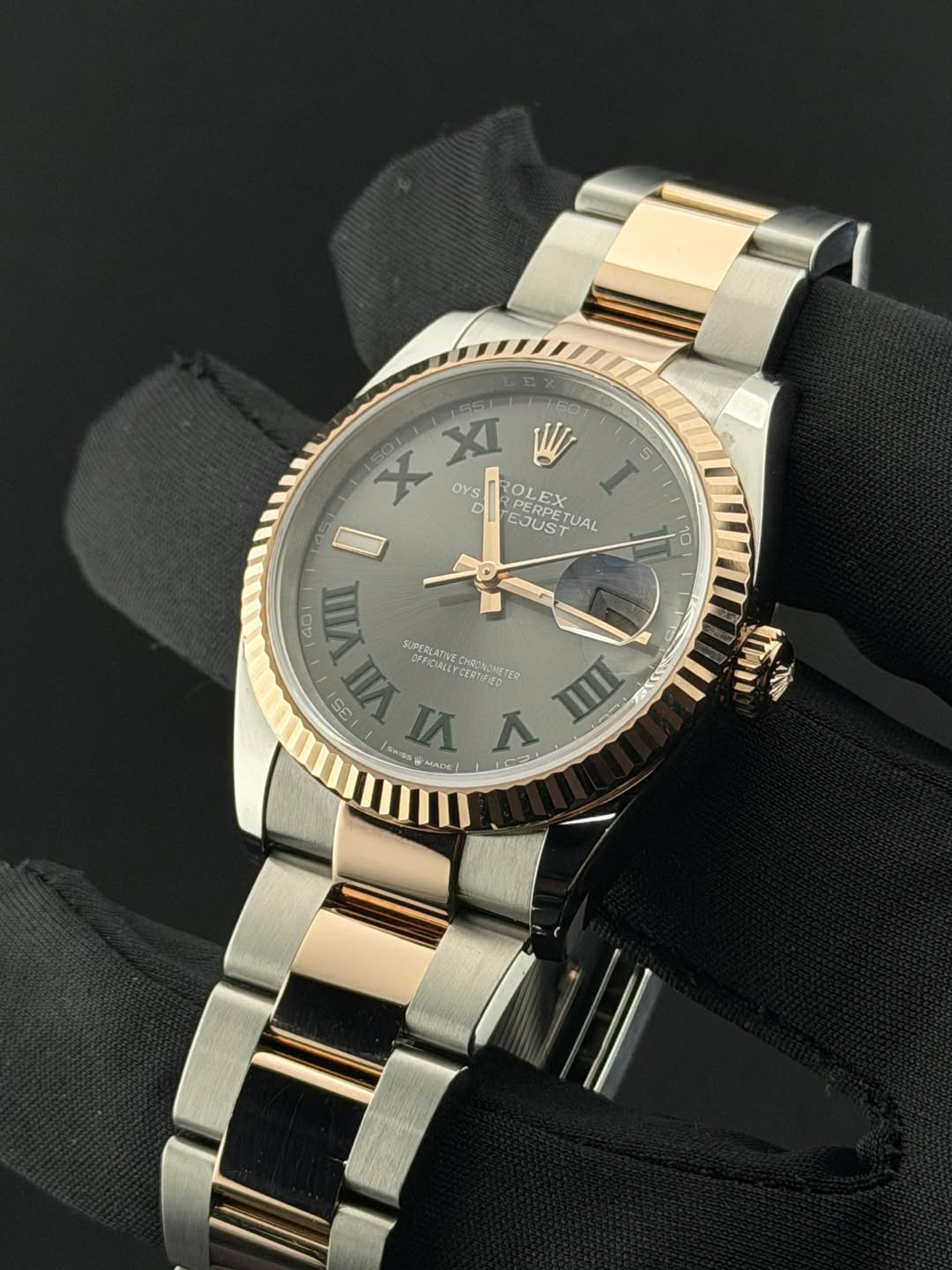 May be an image of wrist watch and text