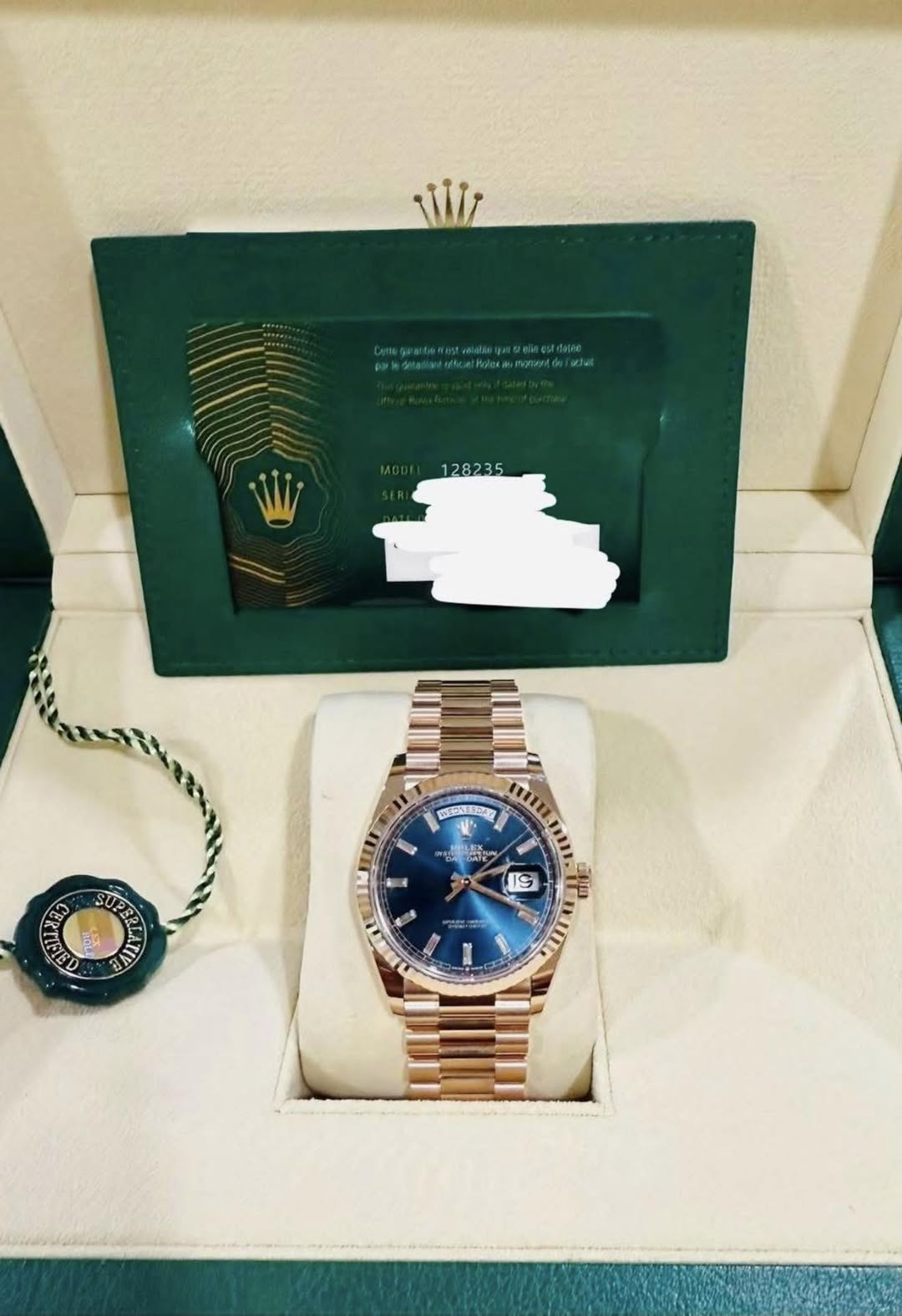 May be an image of wrist watch and text