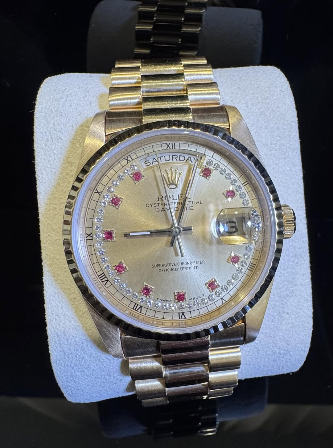 May be an image of wrist watch and text
