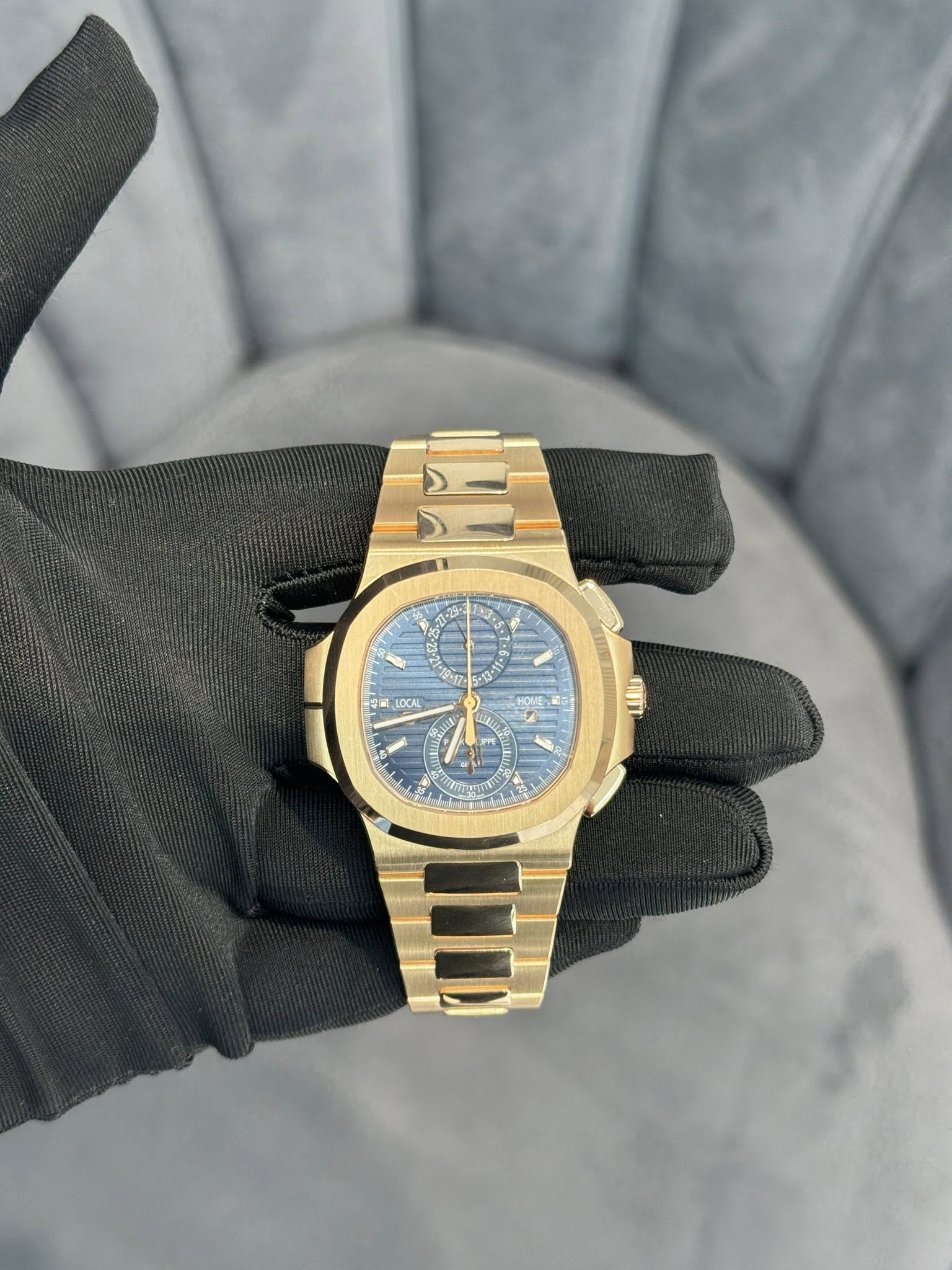 May be an image of wrist watch and text