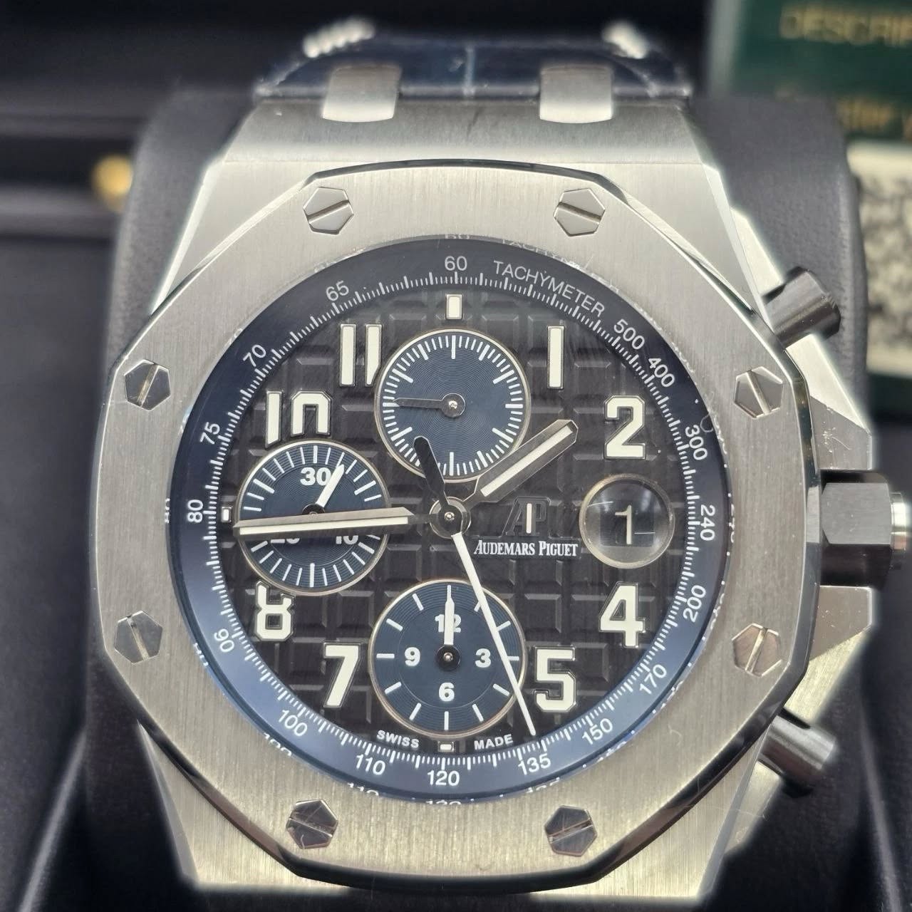 May be an image of wrist watch and text