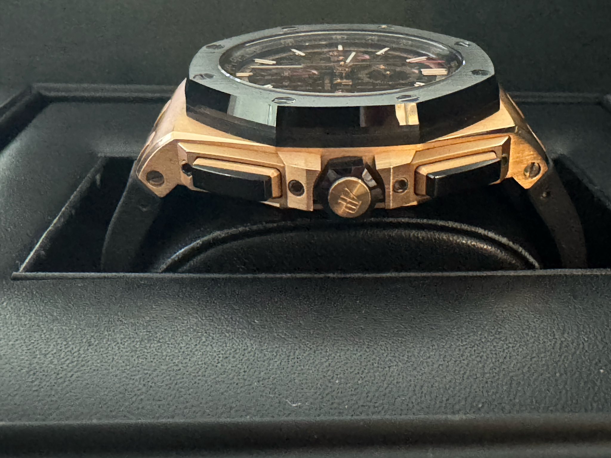May be an image of wrist watch and text