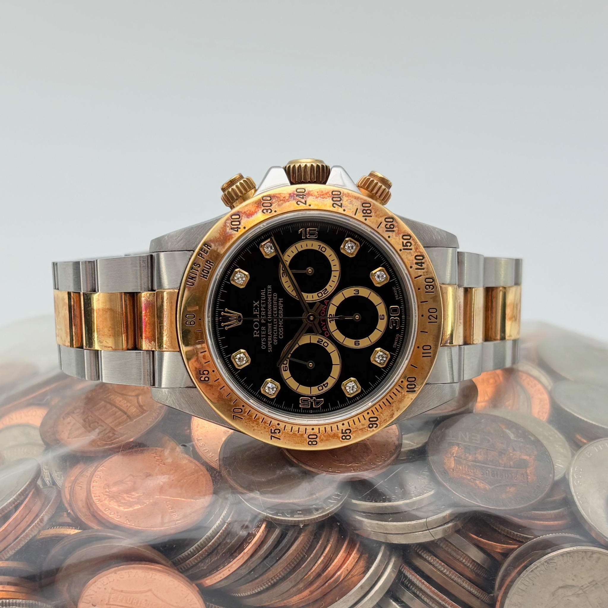 May be an image of wrist watch and text