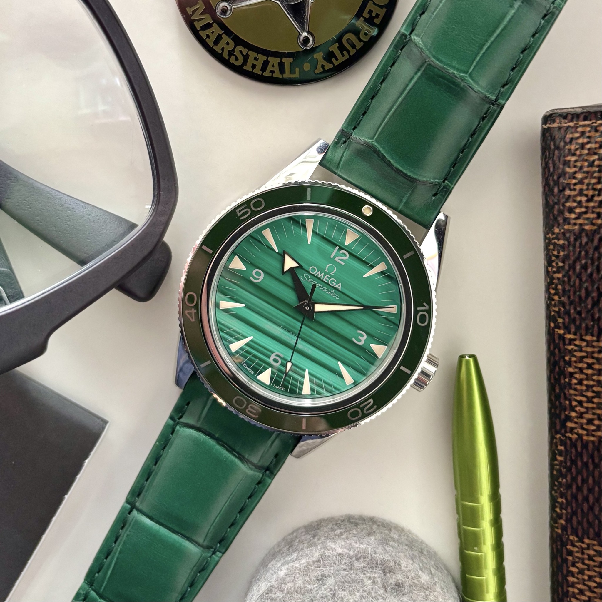 May be an image of wrist watch and text