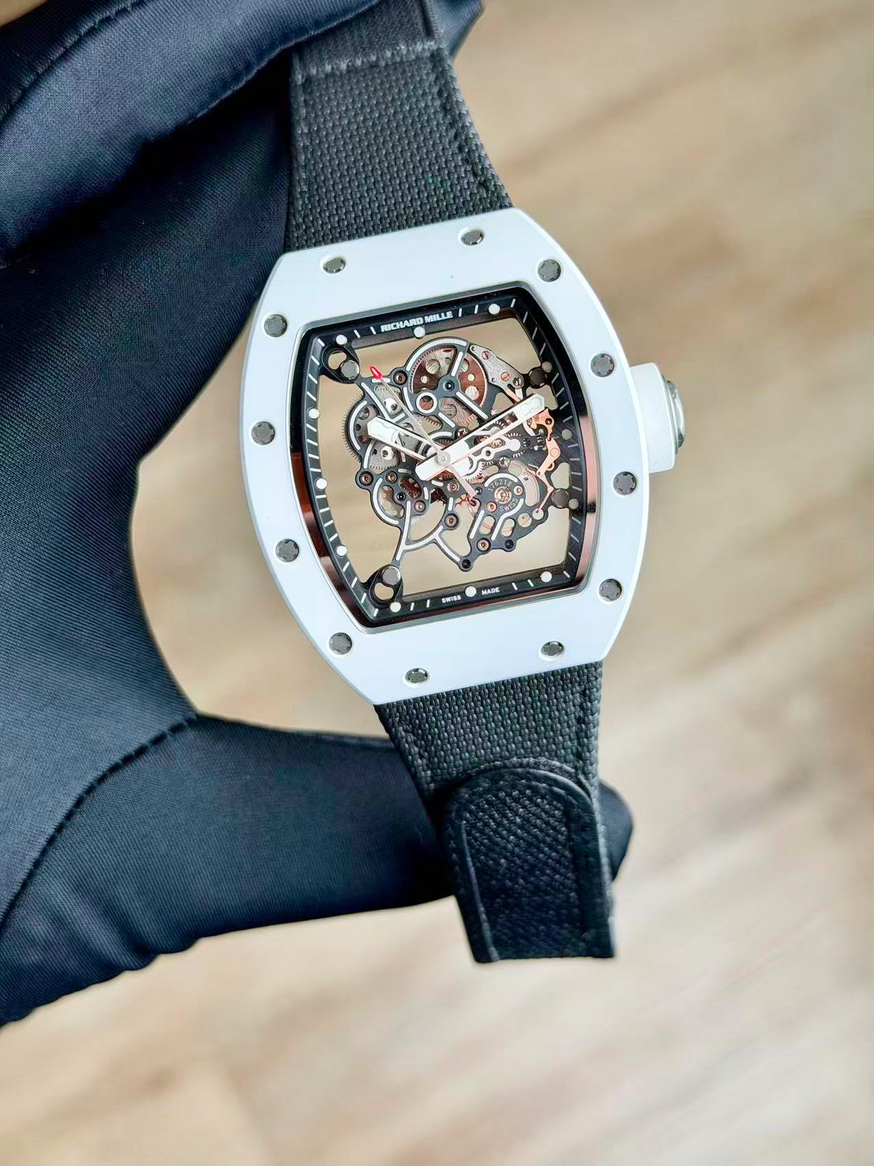 May be an image of wrist watch and text