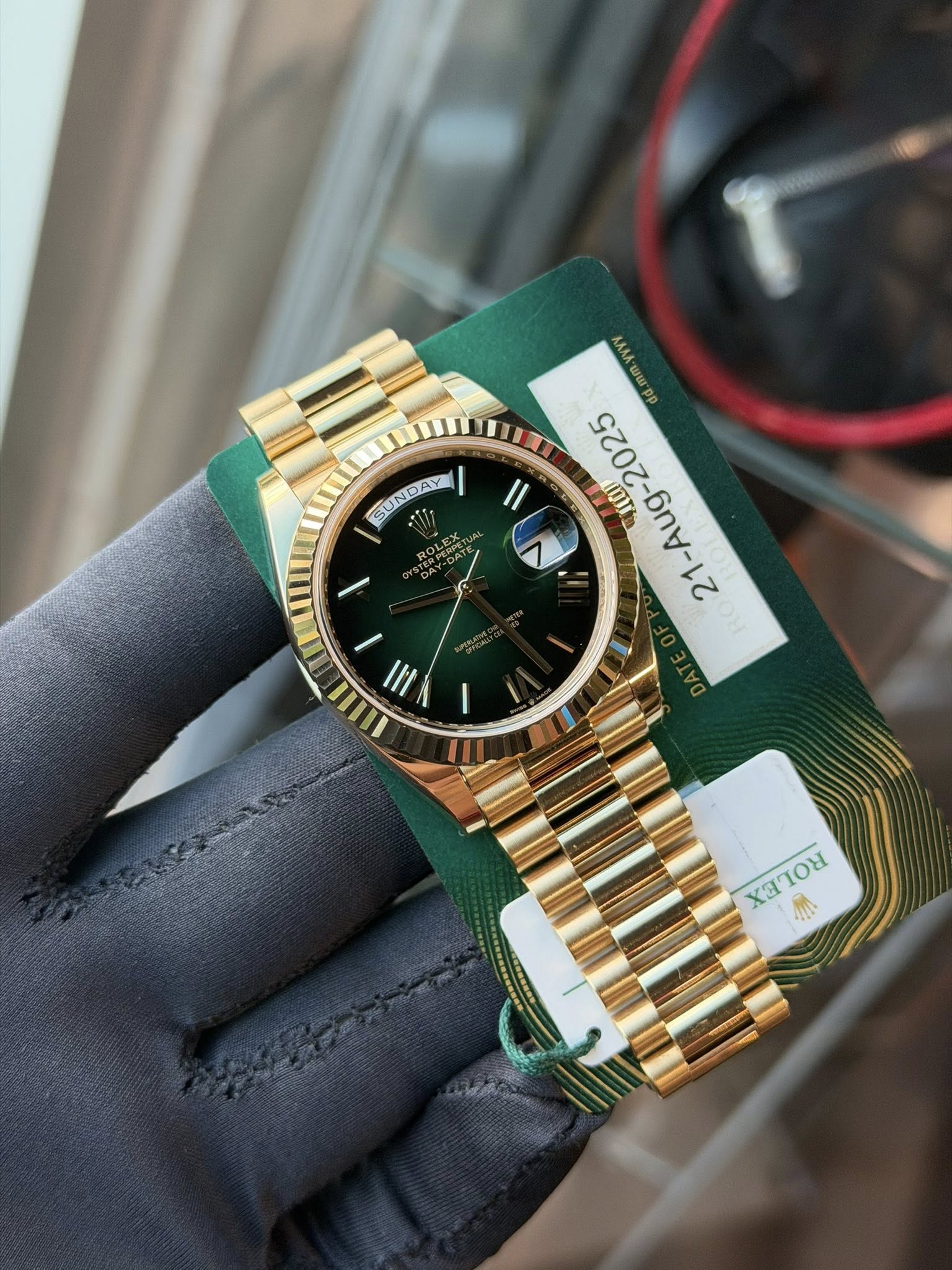 May be an image of wrist watch and text
