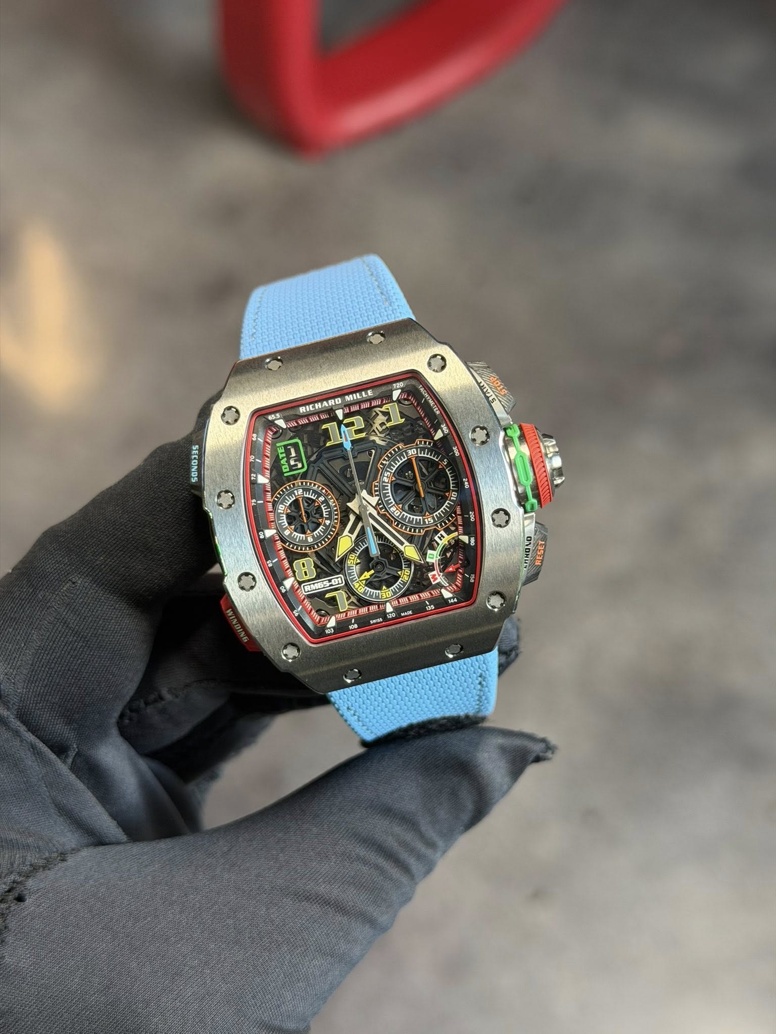 May be an image of wrist watch and text