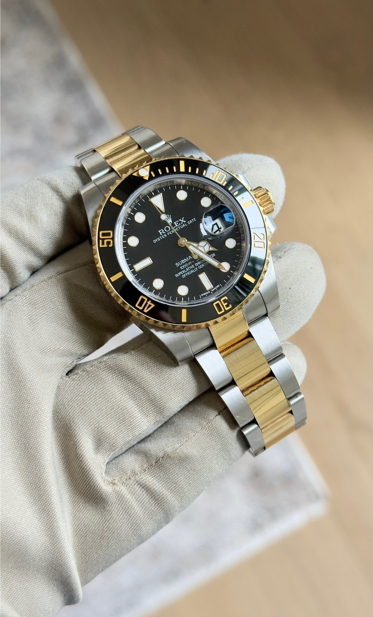 May be an image of wrist watch and text