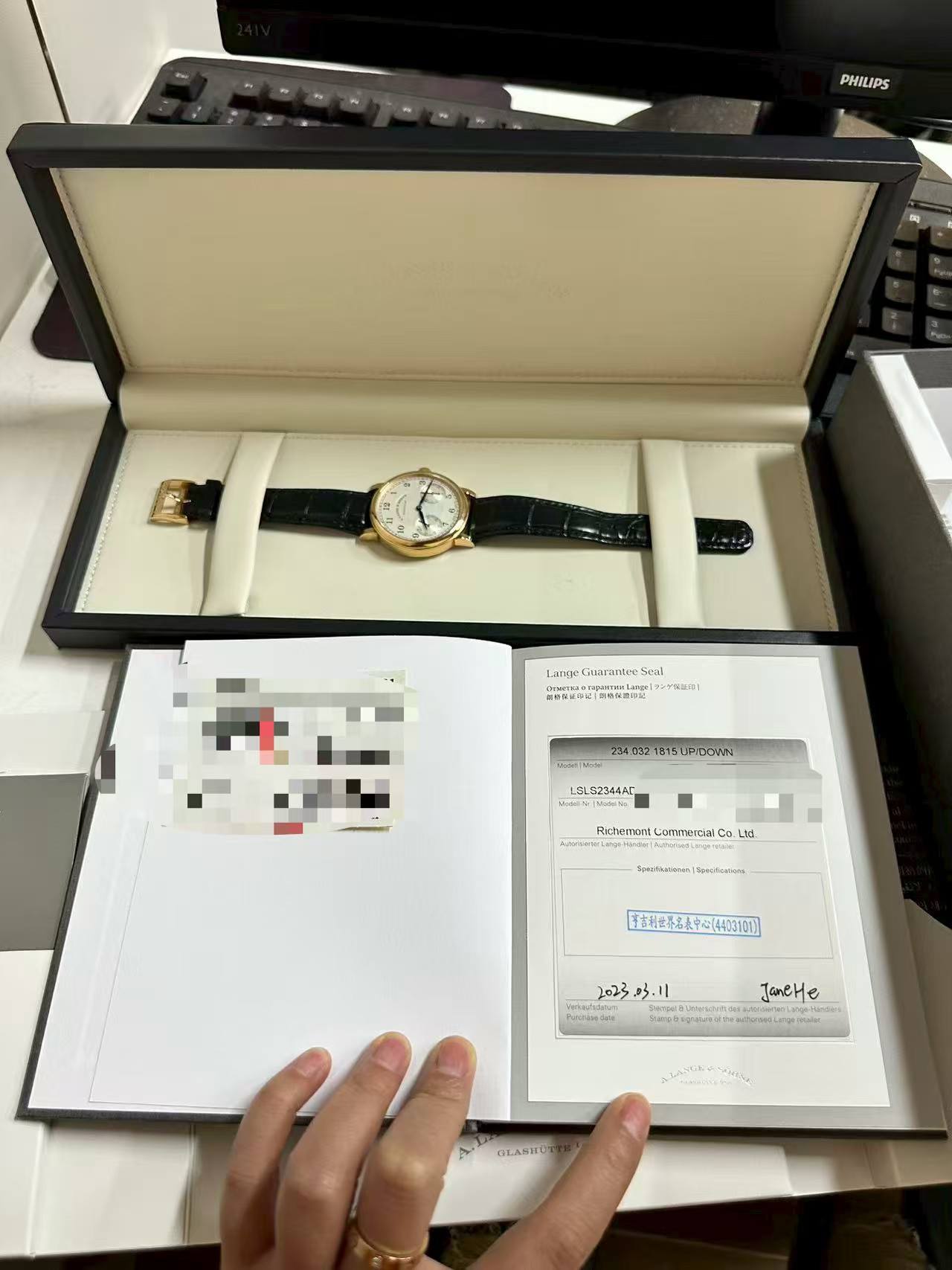 May be an image of wrist watch and text