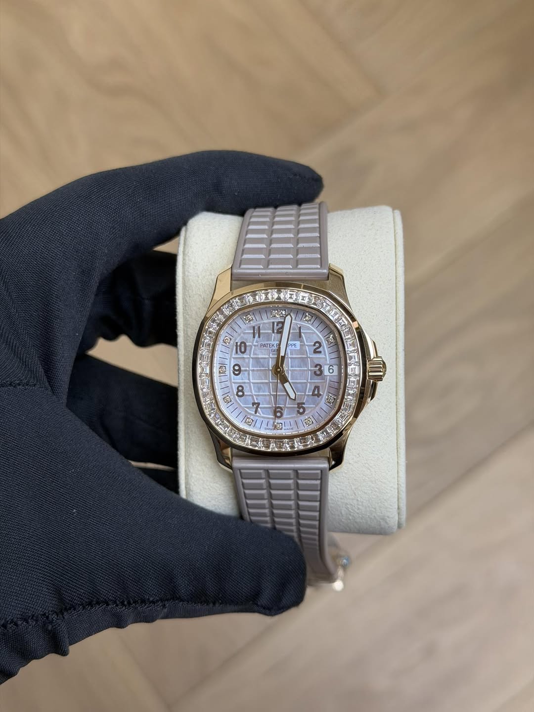 May be an image of wrist watch and text