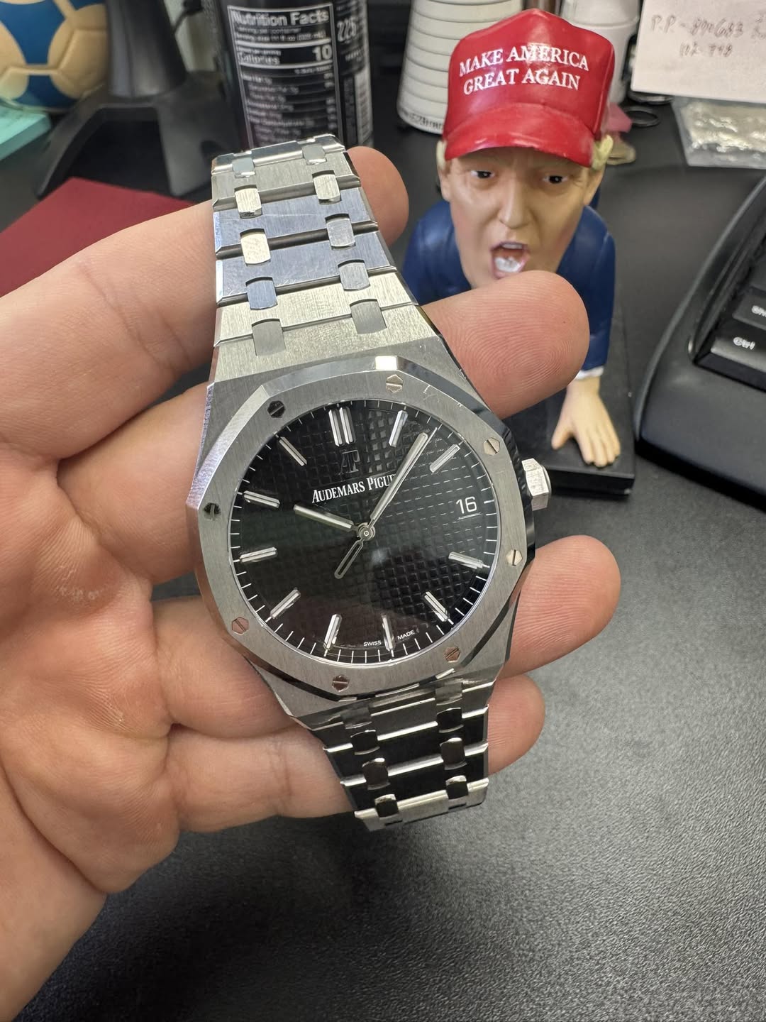 May be an image of digital watch and text