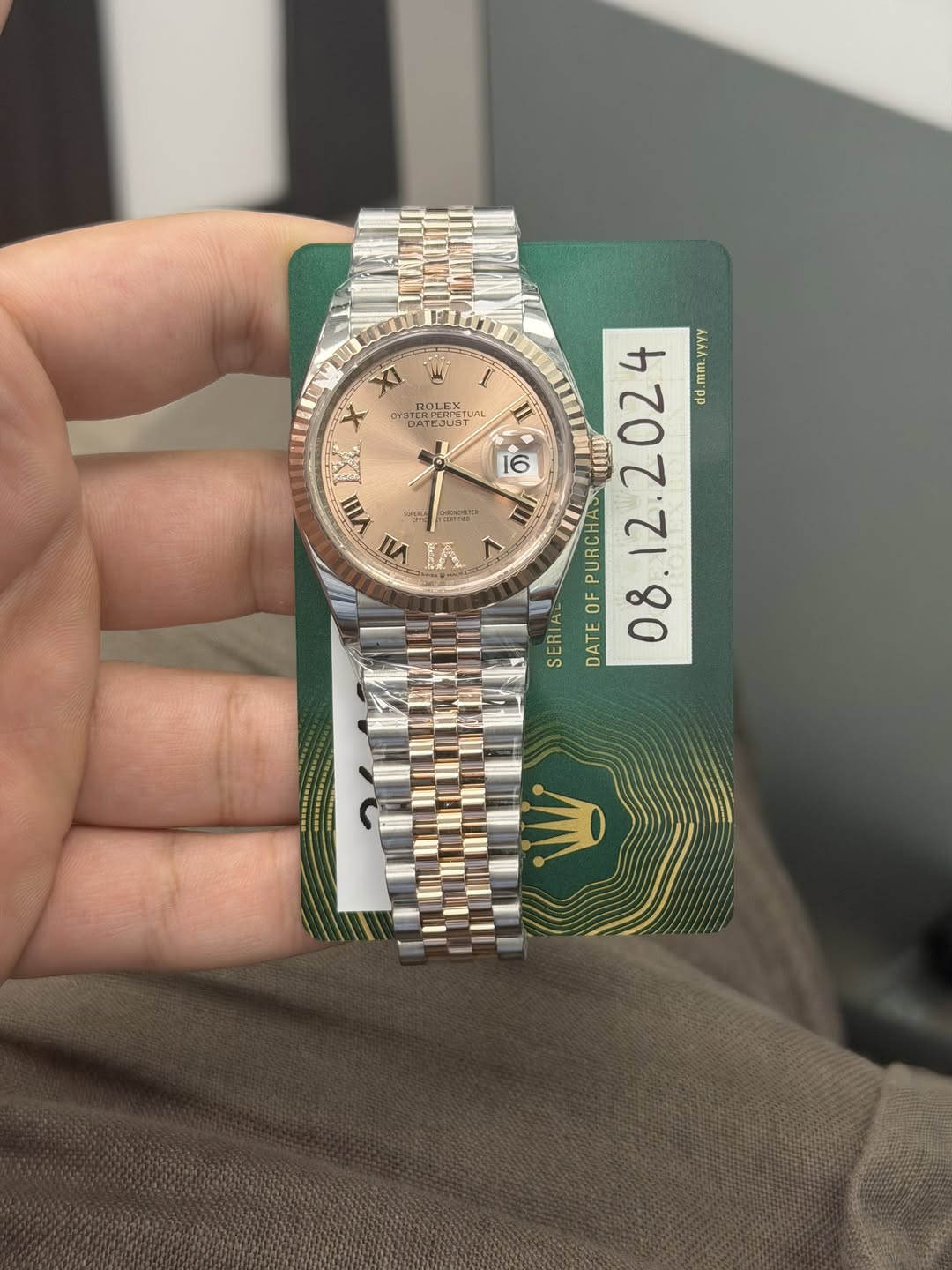 May be an image of wrist watch and text that says 'L Xl לריצימיה nb BATEOIST TEOJIST ROLEX JaL ကက عة VIII PRA VII 塑 4 16 S ト 대~ 日モ PURCHAS 1W dd.mm.yyyY ΛΛΛΑ SERIAL OF DATE…