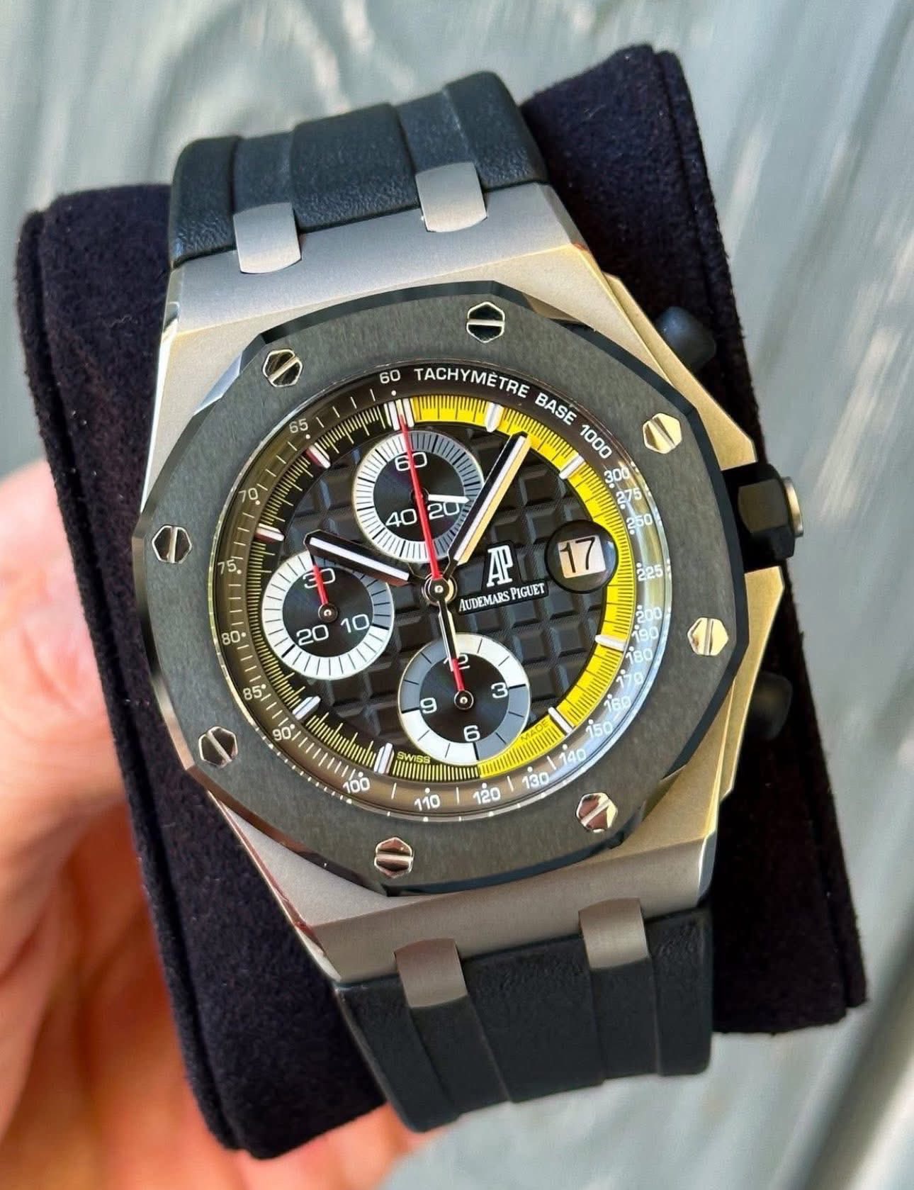 May be an image of wrist watch and text