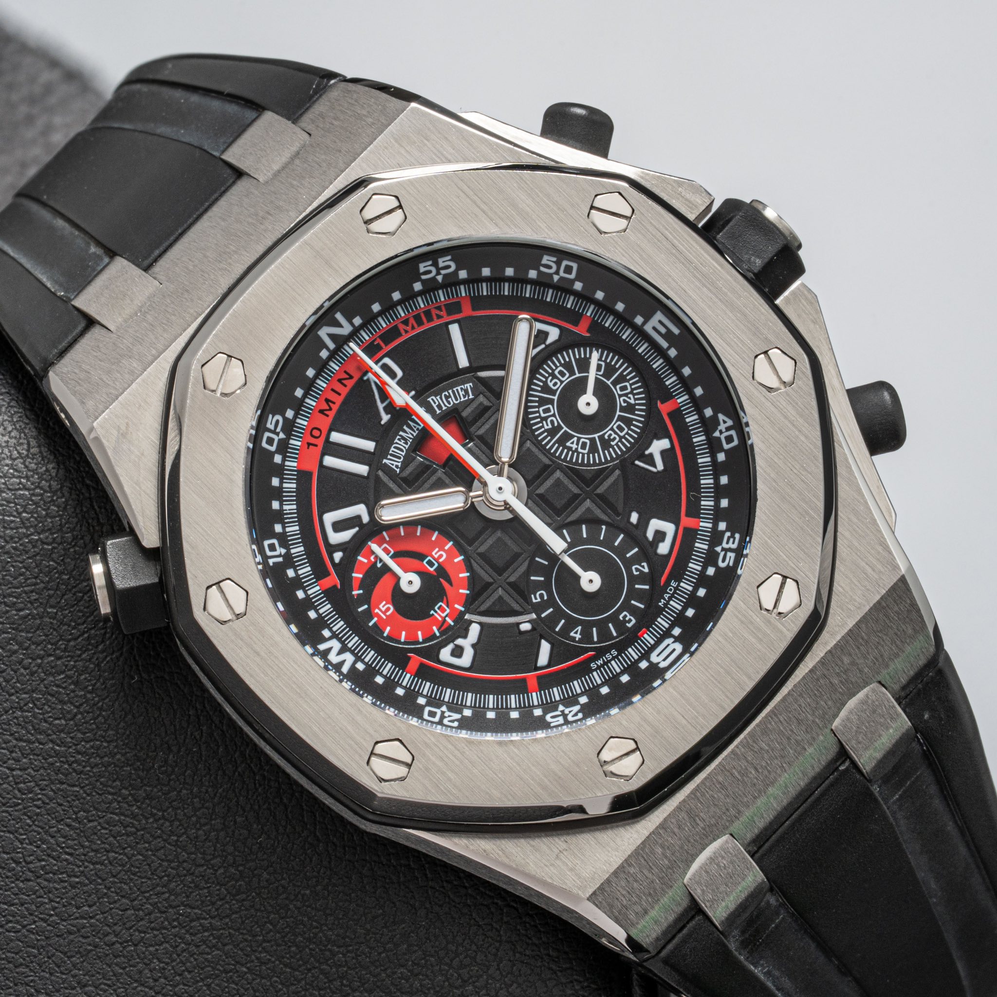 May be an image of wrist watch and text