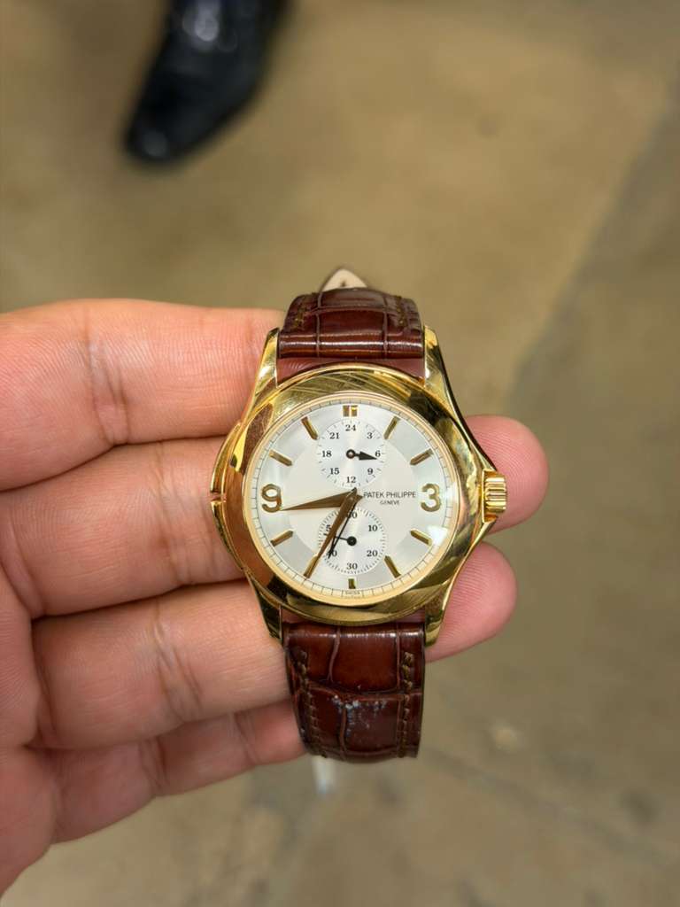May be an image of wrist watch and text that says 'F αρα 1 12 12 PATEK 6MИ PPE PHILIPPE 3 م +'