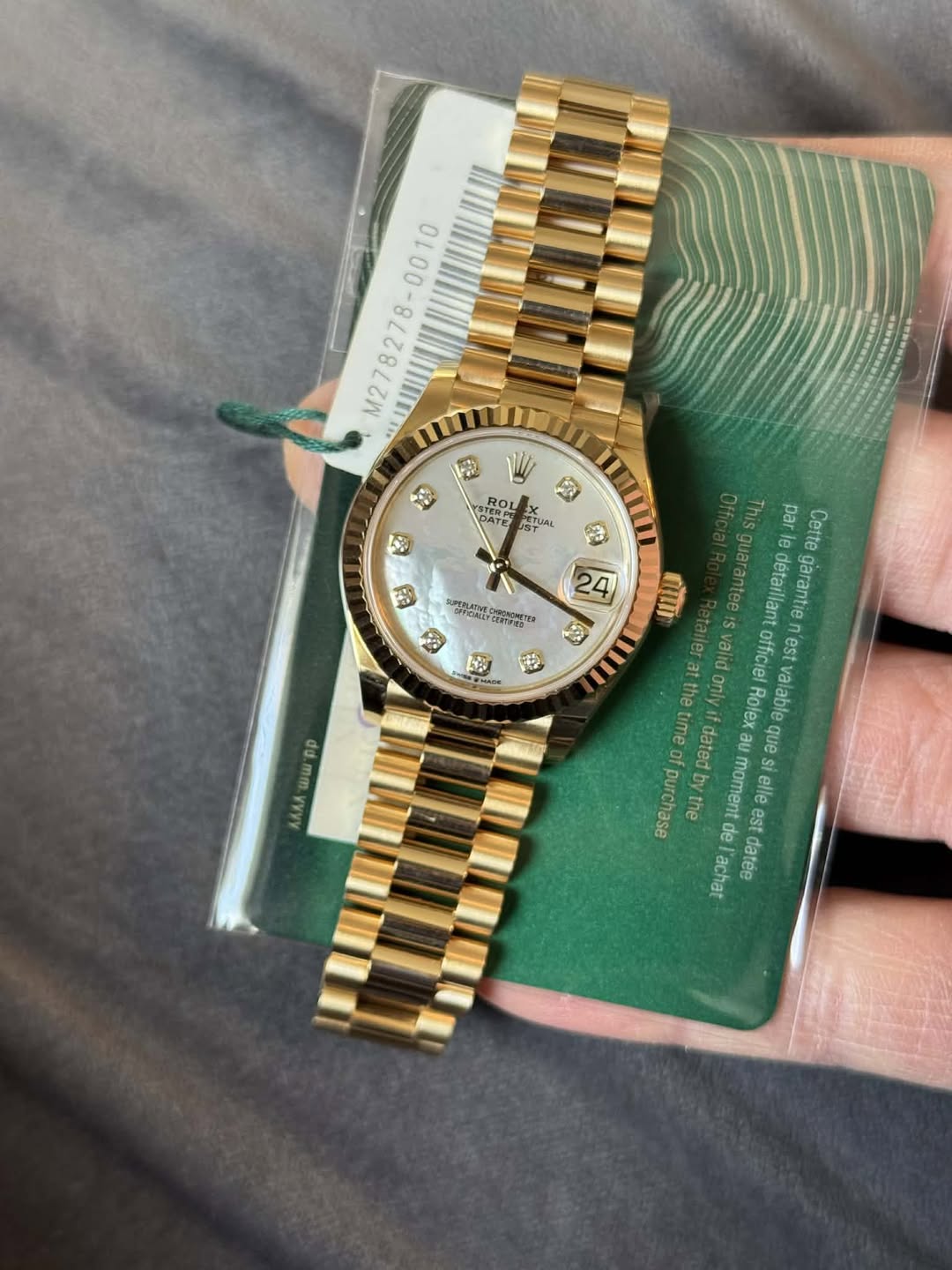 May be an image of wrist watch and text that says 'M278278-0010 ー STERPE የርን ROL PETUAL PETUAL L 93 A ኢው SRUNESOIT COTVES HeTpynyT H wwpp par Cette guarantee detaillant garantie…