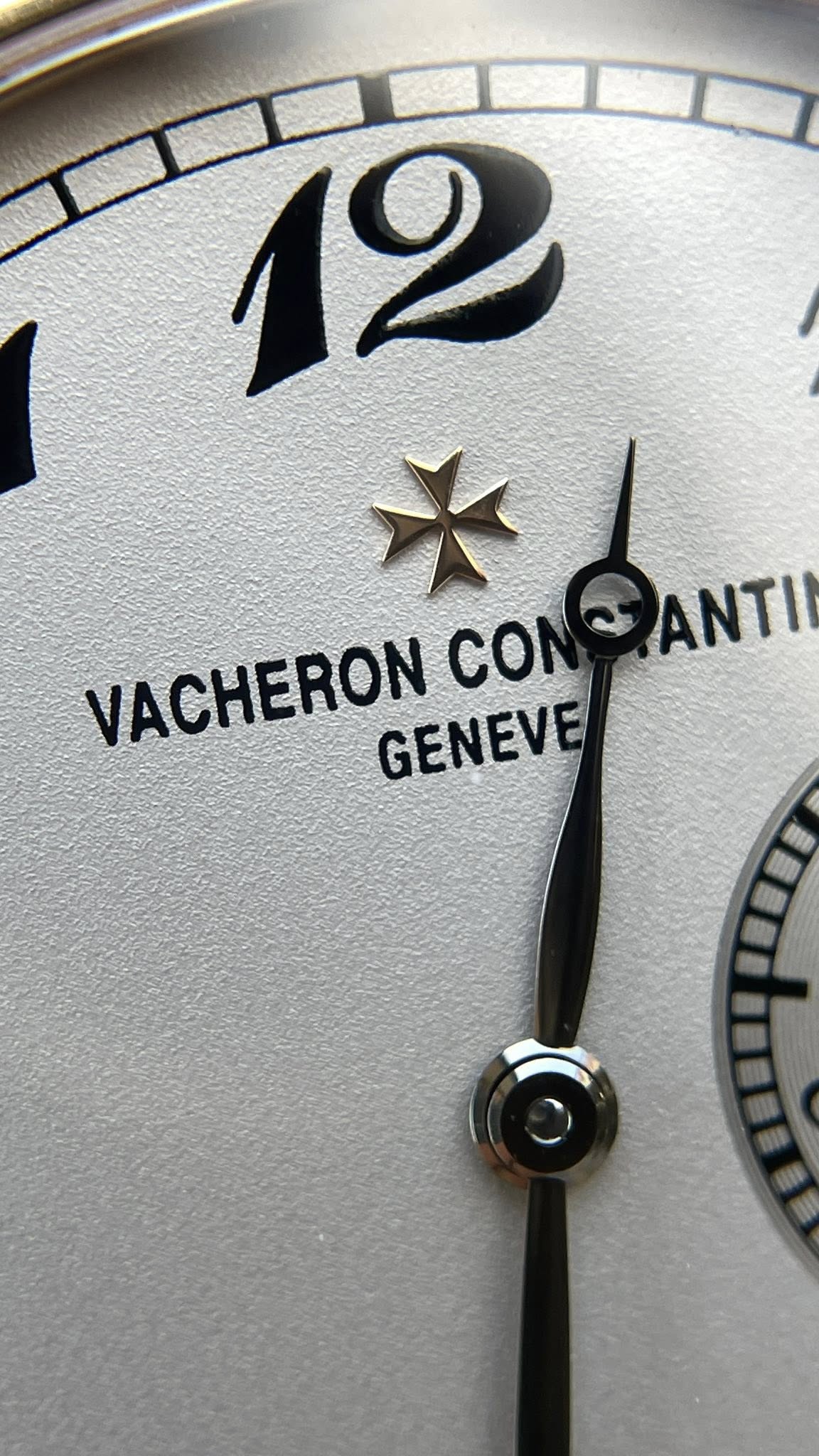 May be an image of wrist watch and text that says '12 * VACHERON CON GENEVE ANTI'