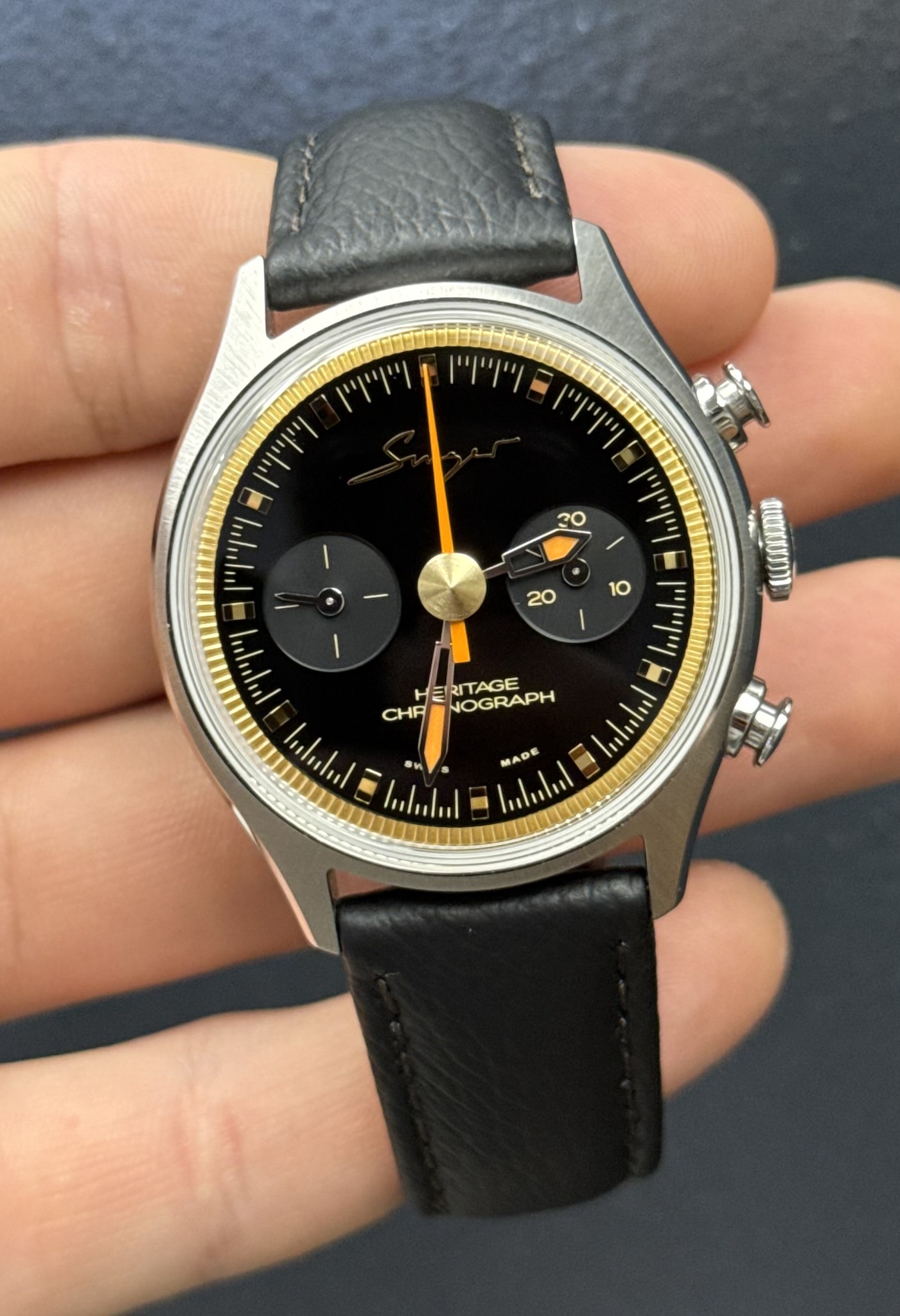 May be an image of wrist watch and text that says '30 የጥጥጥሣገ וייויןיין ייוייויין 10 וייויןי 20 I וייוייוין ሮማንግ 스 תיוייויי וייויו וייויוין HERRITAGE CHA HE NOGRAPH ויוייןיי Иc…