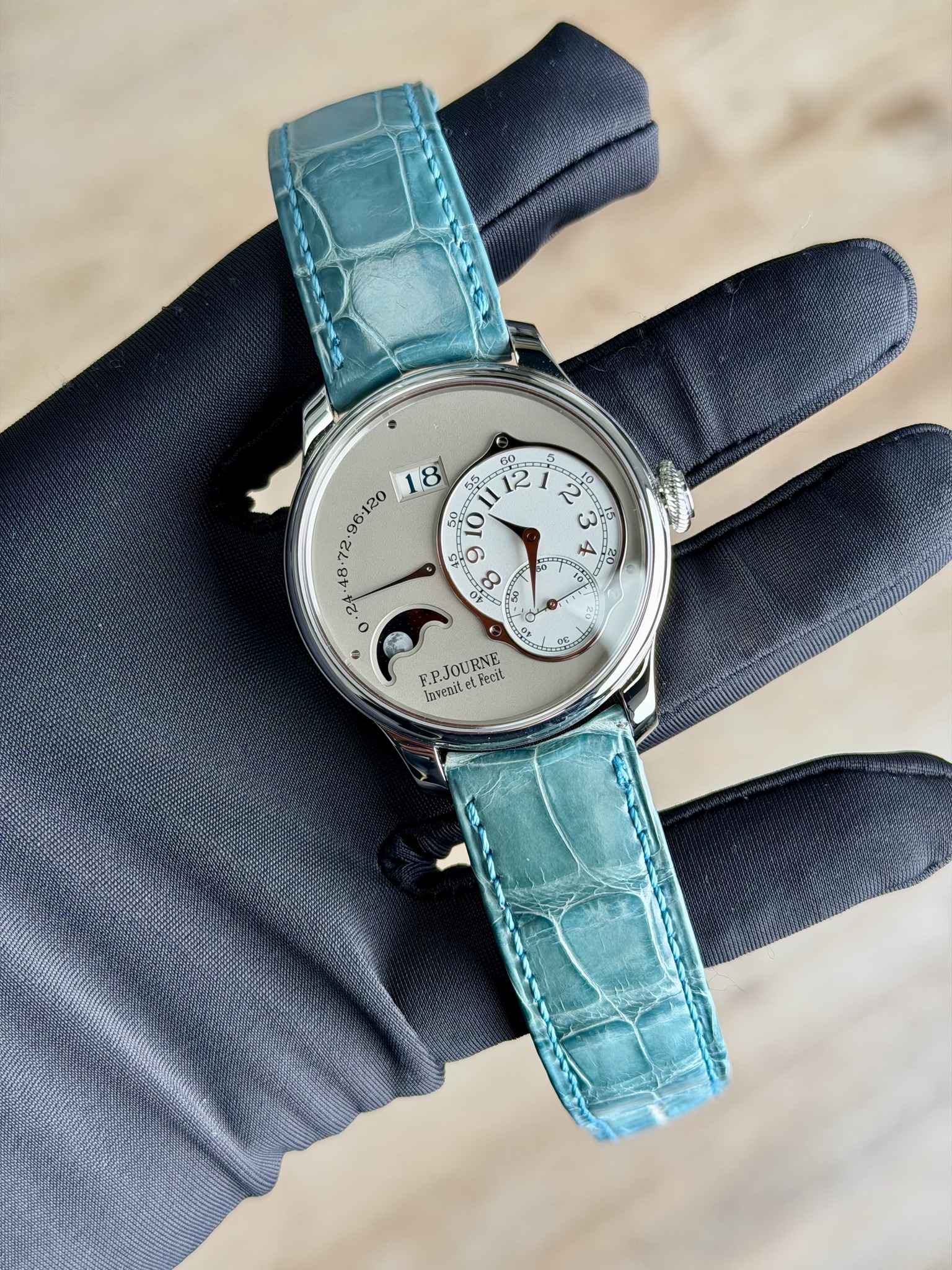 May be an image of wrist watch and text