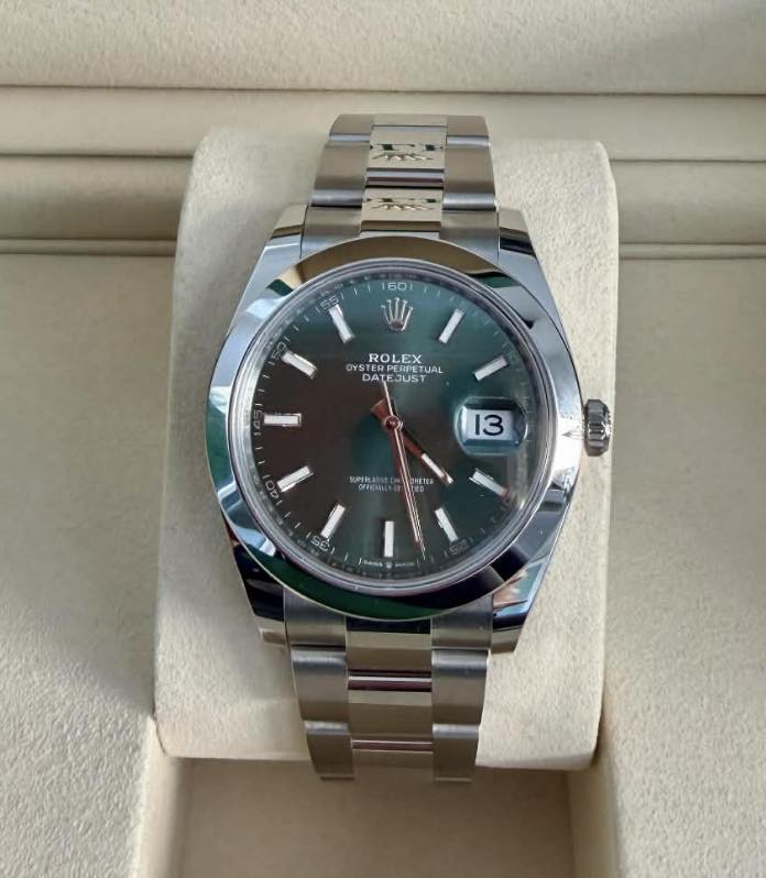 May be an image of wrist watch and text that says '160 Wy ROLEX DYS PERFETUA JAL STERPERI TERPERPETI าบรา ATEJUS ปร 13 低 GC നു Se Jwana'