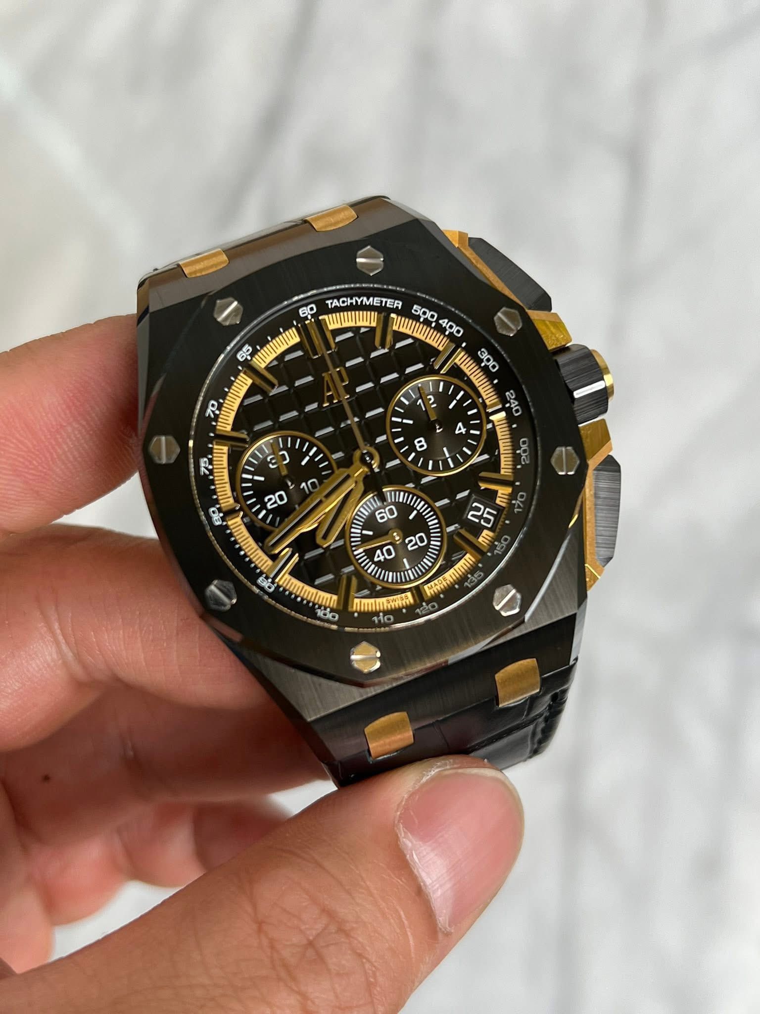 May be an image of wrist watch and text