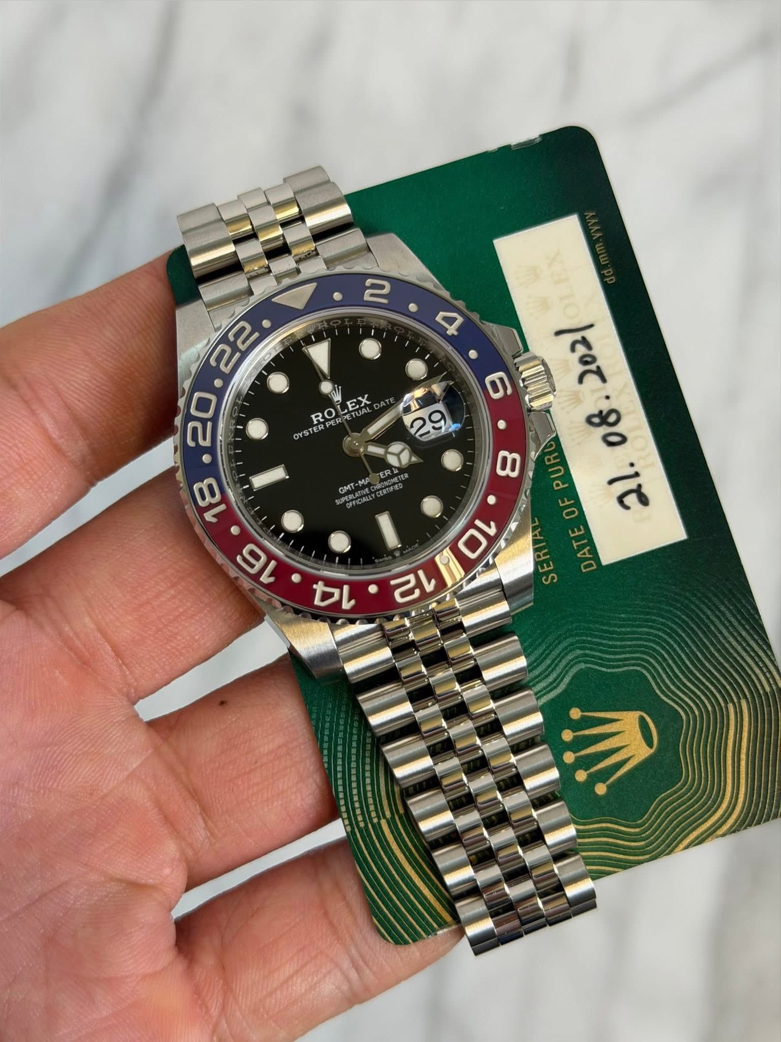 May be an image of wrist watch and text that says ' RO ROLEX EX 1 29 SnTO 6 AINI に O 14 0 12'