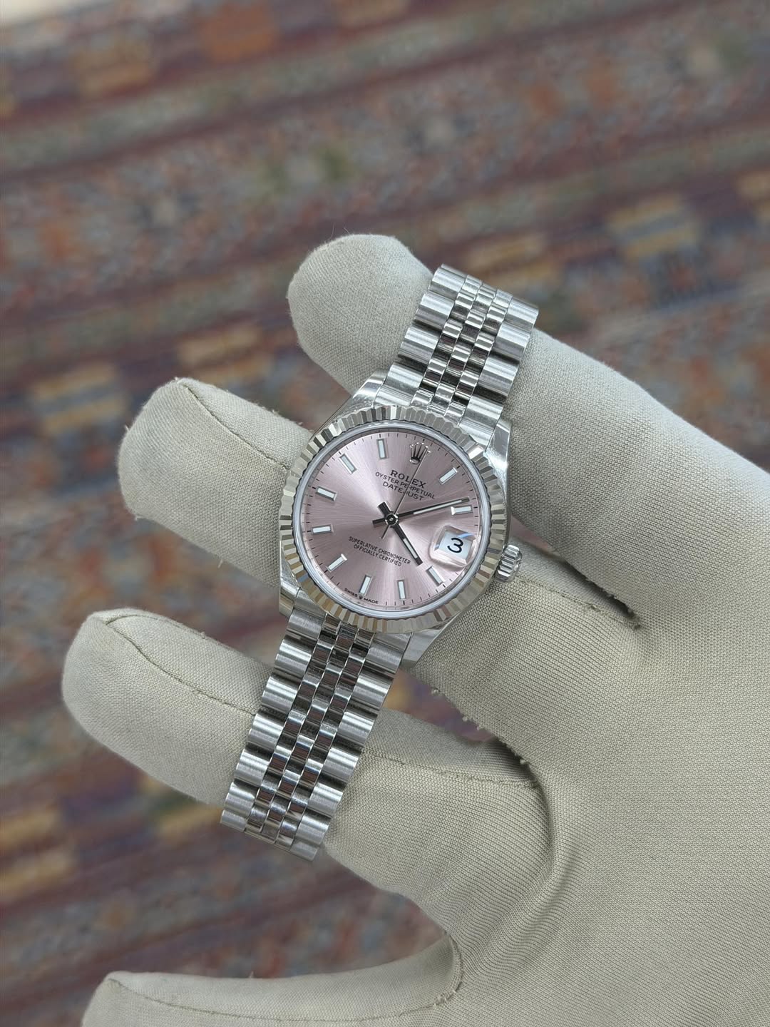 May be an image of wrist watch
