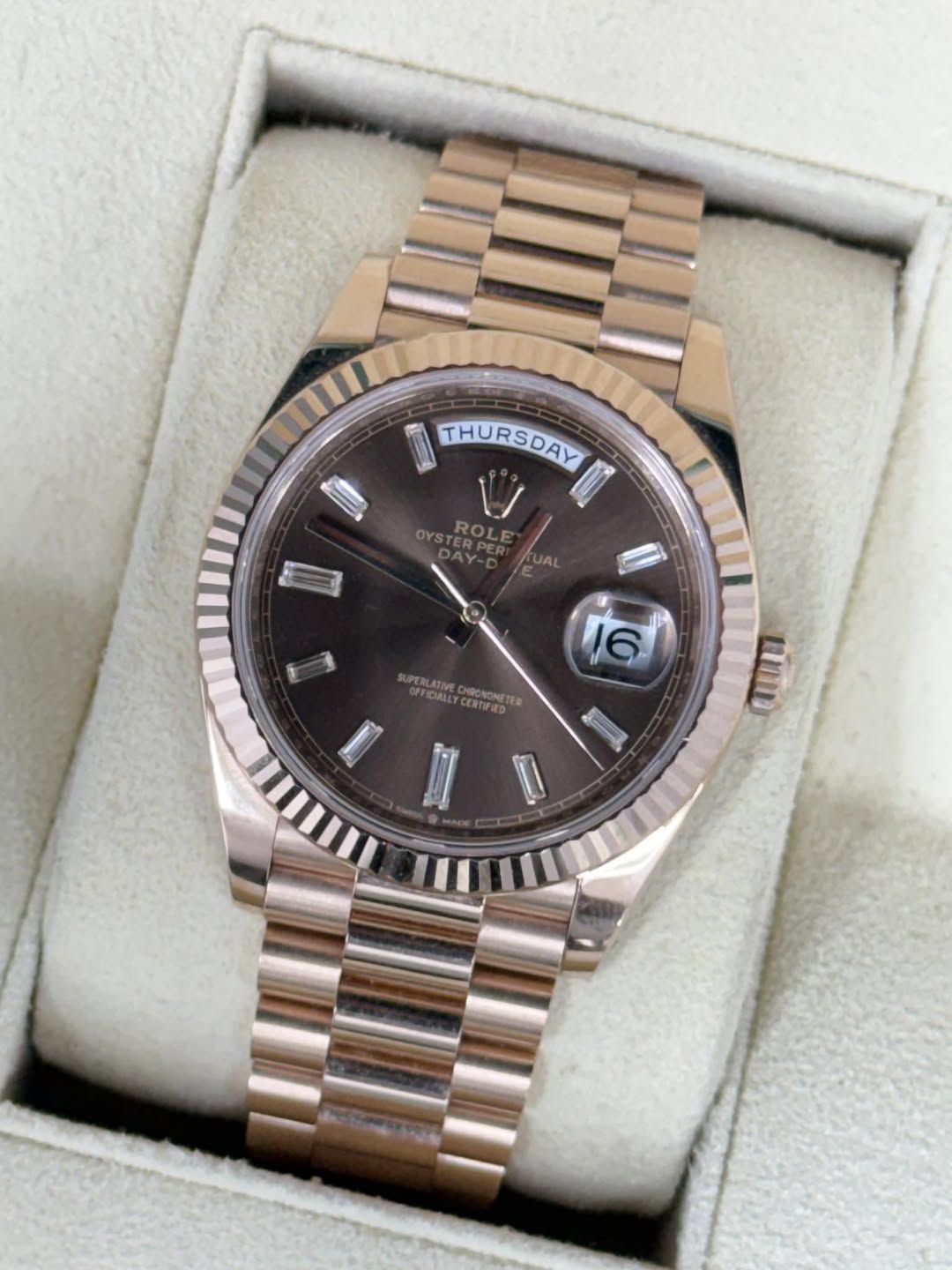May be an image of wrist watch and text