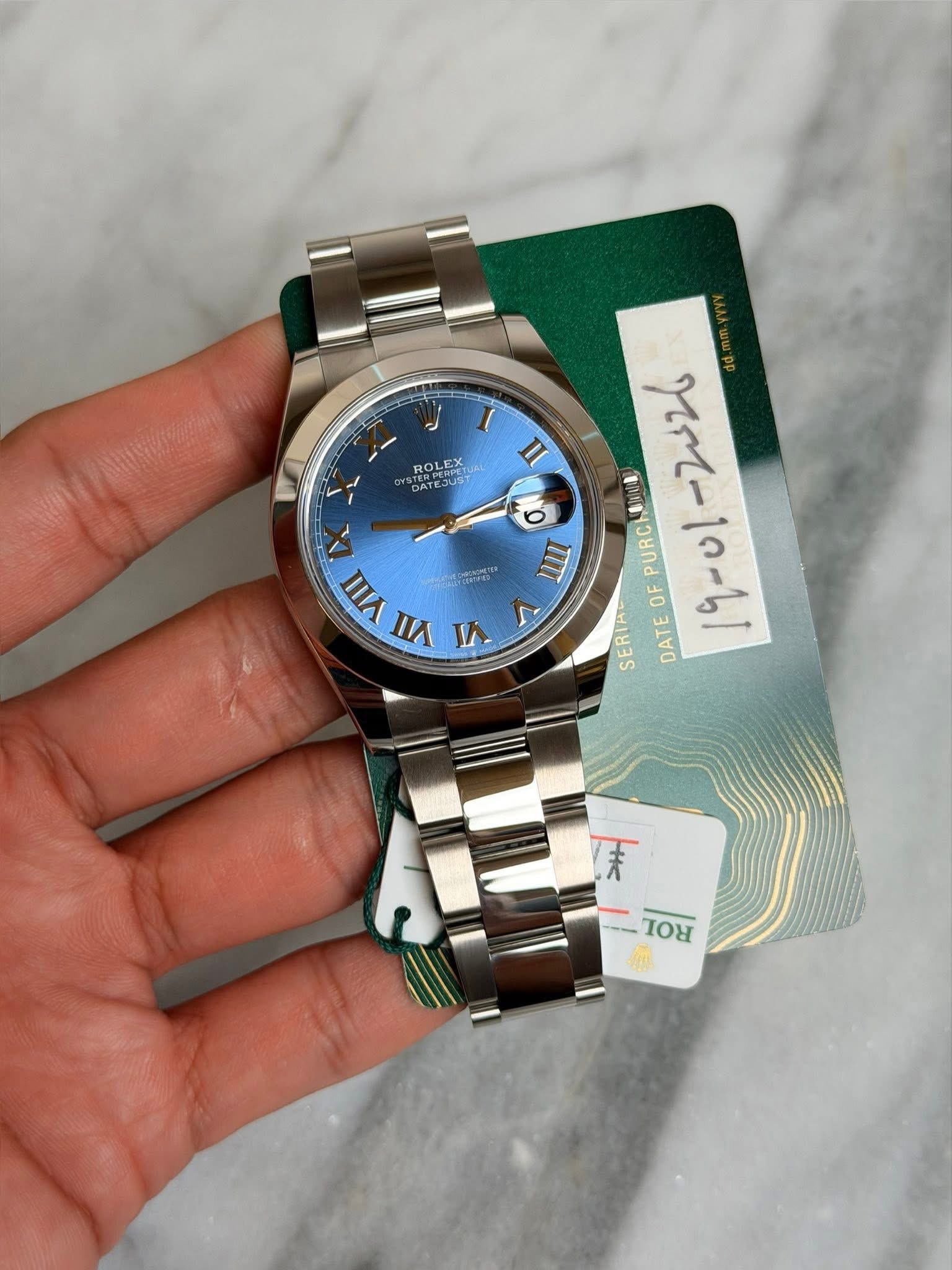 May be an image of digital watch and text