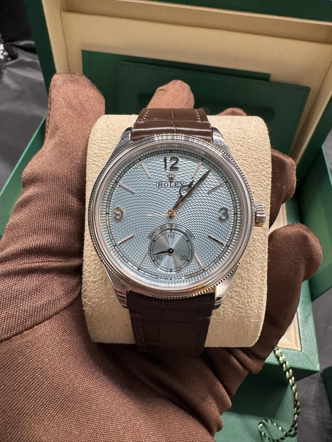 May be an image of wrist watch and text