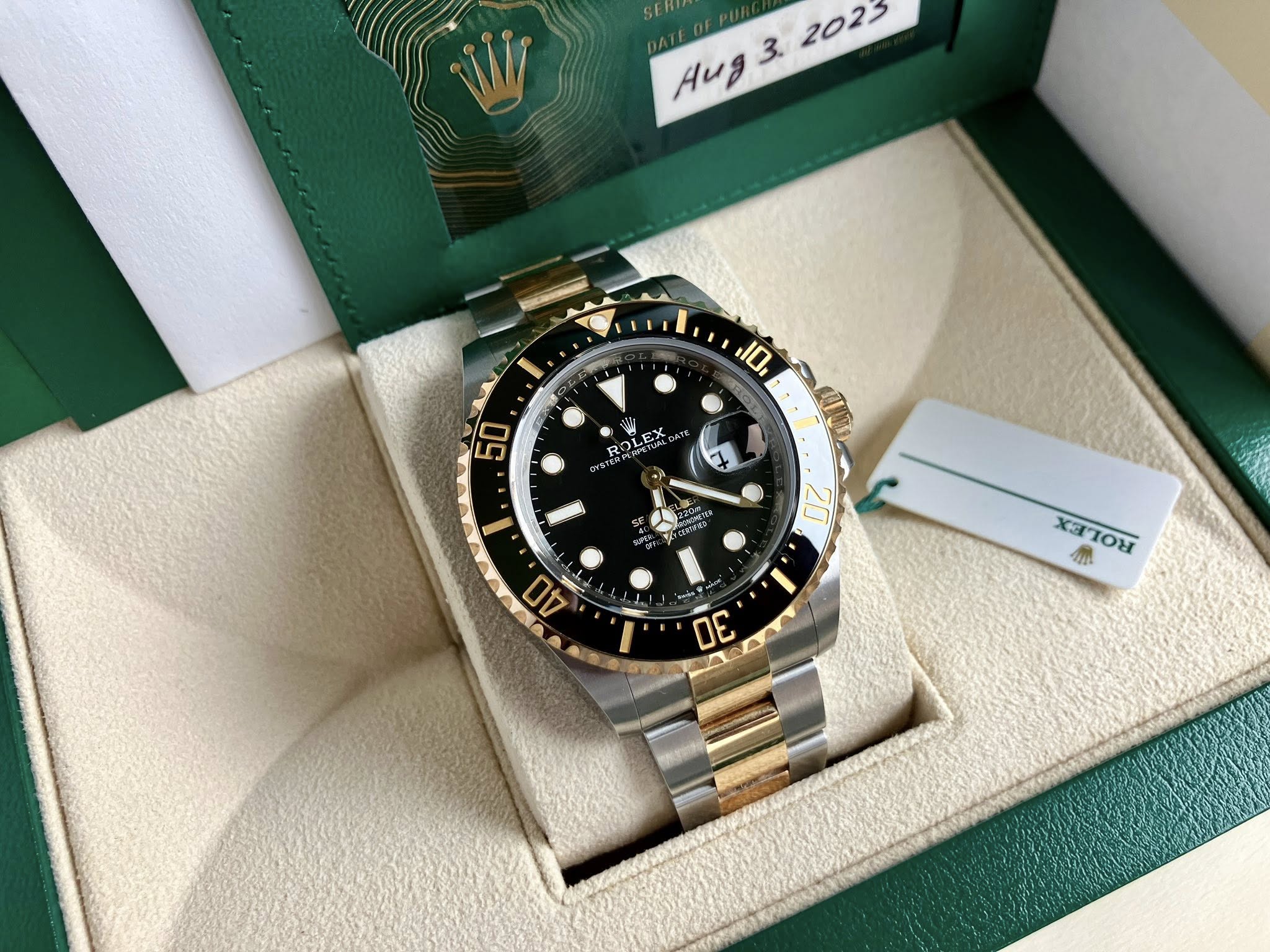 May be an image of wrist watch and text