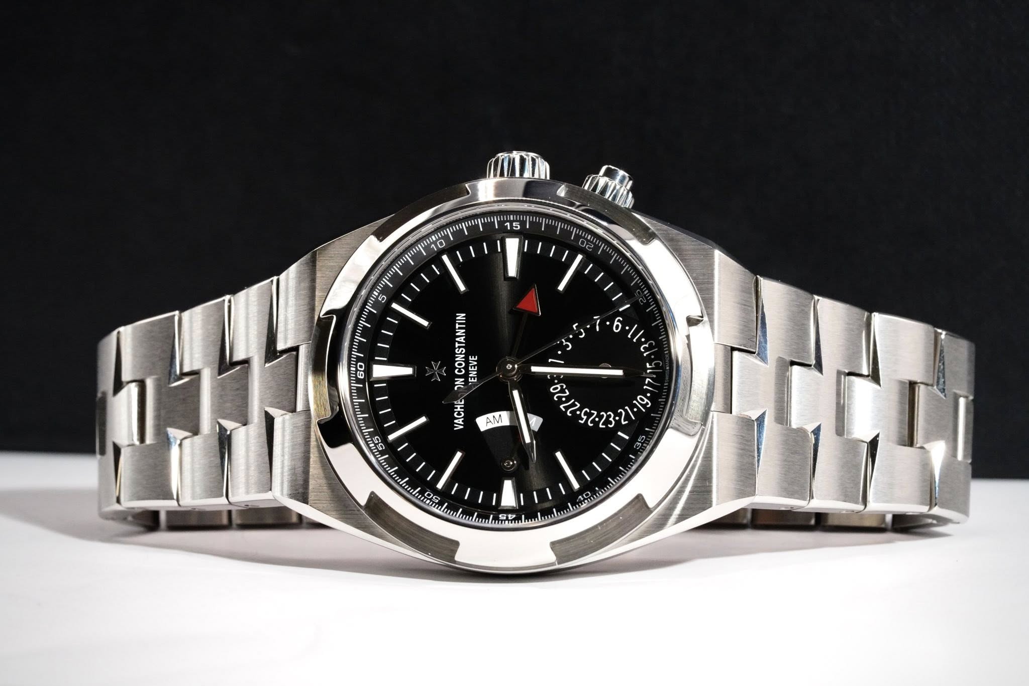 May be an image of wrist watch and text