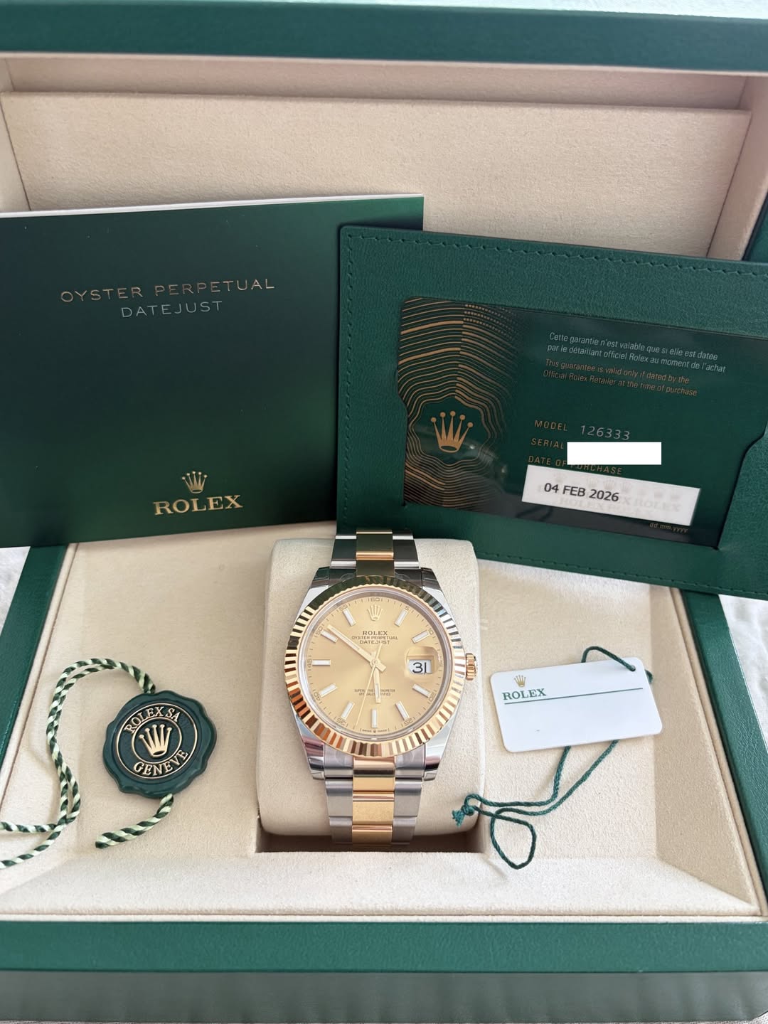 May be an image of wrist watch and text that says 'OYSTERPERPETUAL TUAL DATEJUST ROLEX 04 04 FEB 2026 RONES で新聞 MET DVTE ONTES 31 一ロ ភ கய் ROLEXSA SA RO W CENEV GENE ROLEX EX ROL'