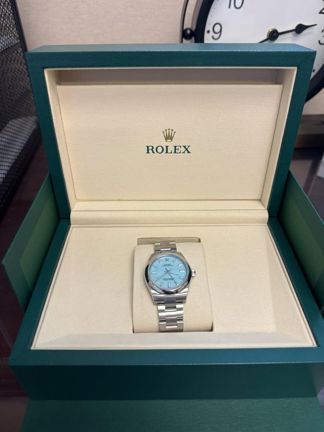May be an image of wrist watch and text