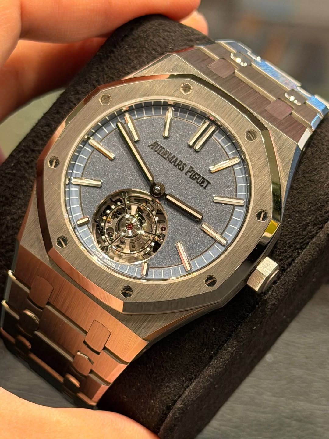 May be an image of wrist watch and text