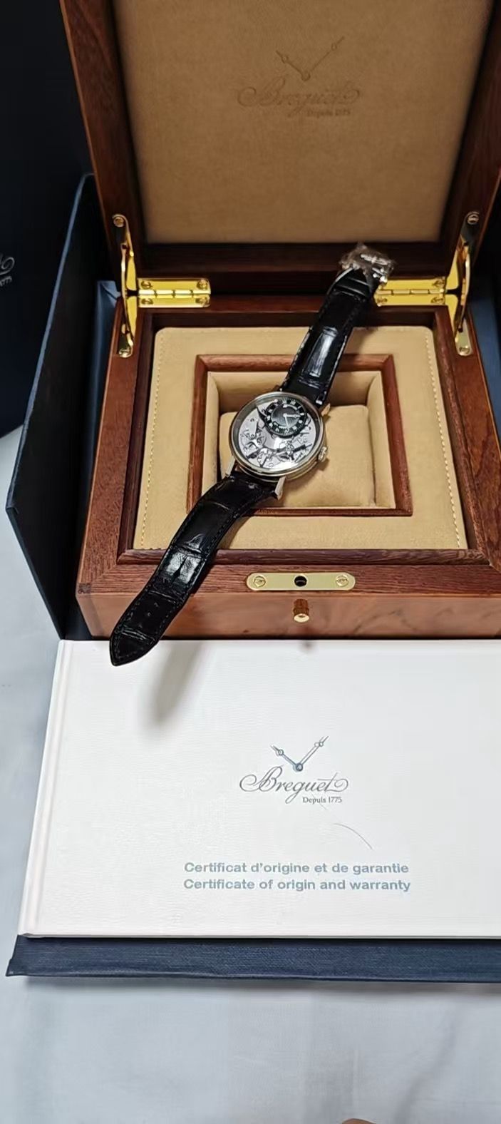 May be an image of wrist watch and text that says '.1 G BBregueto Depuls17 Certficatd'origineetde_garantie de garantie Certificat d'origine Certificate of origin and warranty'