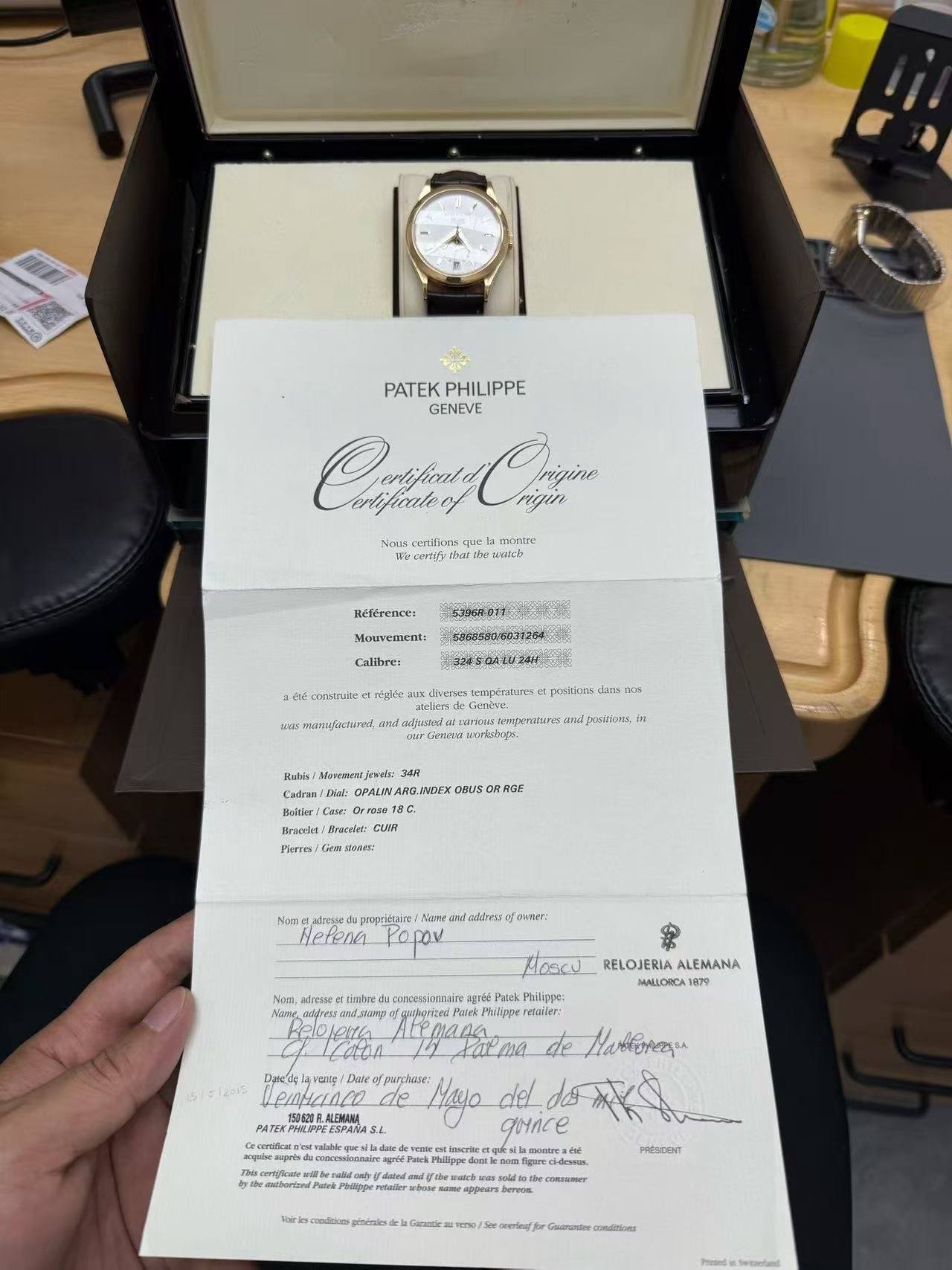 May be an image of wrist watch and text