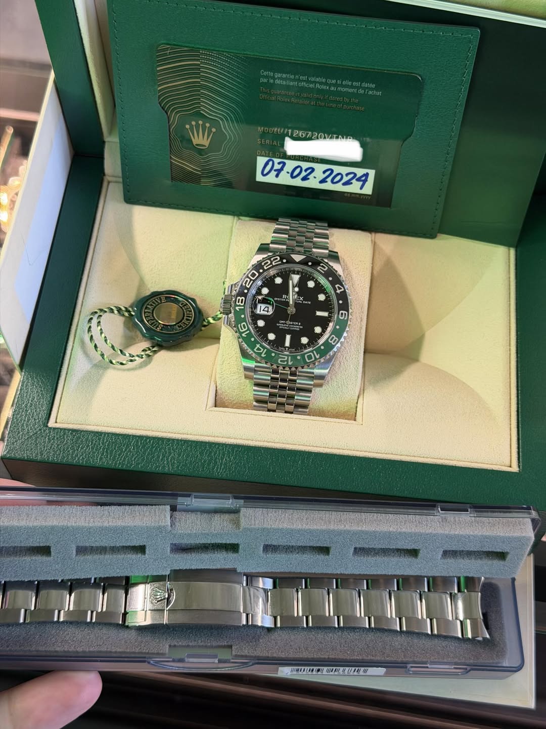 May be an image of wrist watch and text
