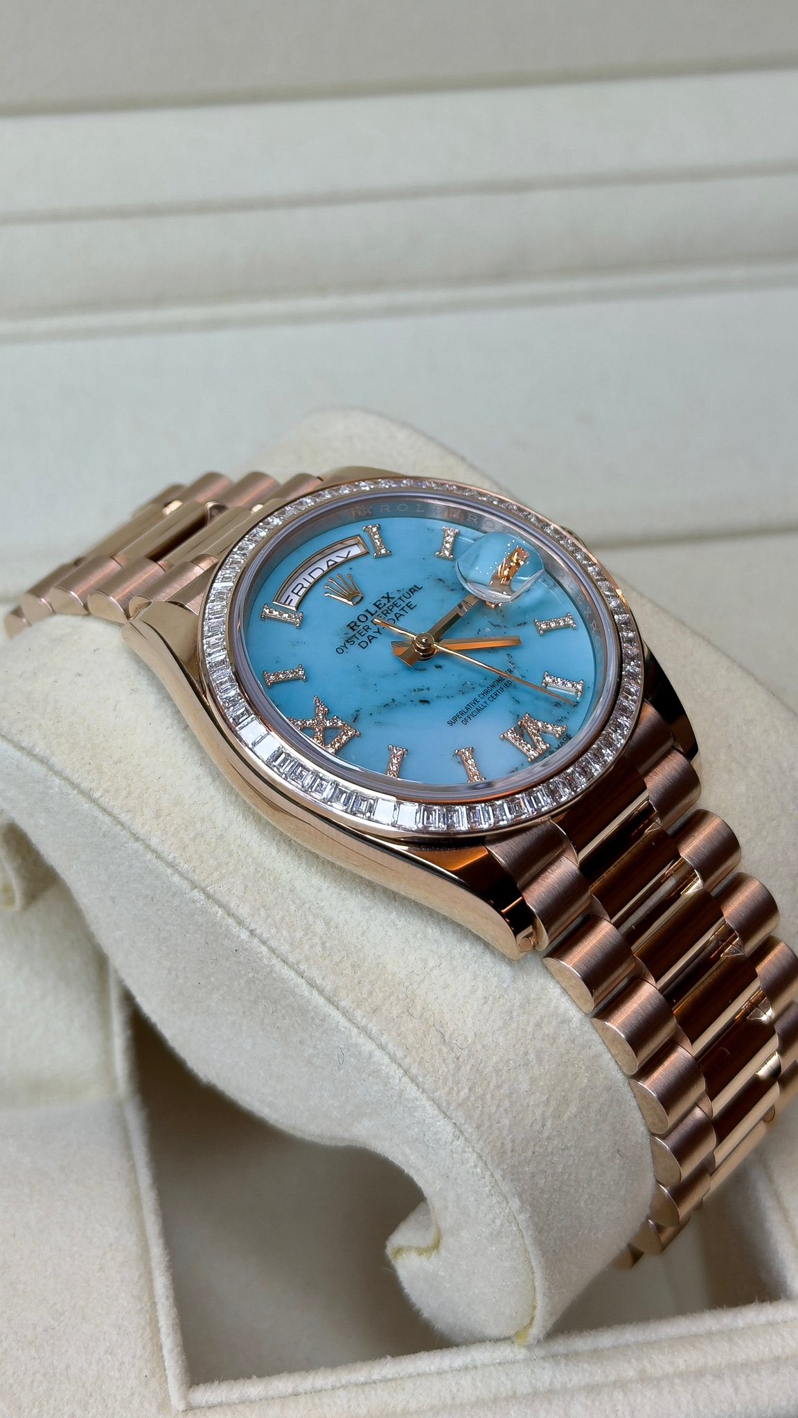 May be an image of wrist watch and text